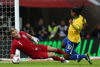 LONDON, ENGLAND - FEBRUARY 06:  Joe Hart of England saves a penalty from Ronaldinho of Brazil  during the International friendly between England and Brazil at Wembley Stadium on February 6, 2013 in London, England.  (Photo by Clive Brunskill/Getty Images)
