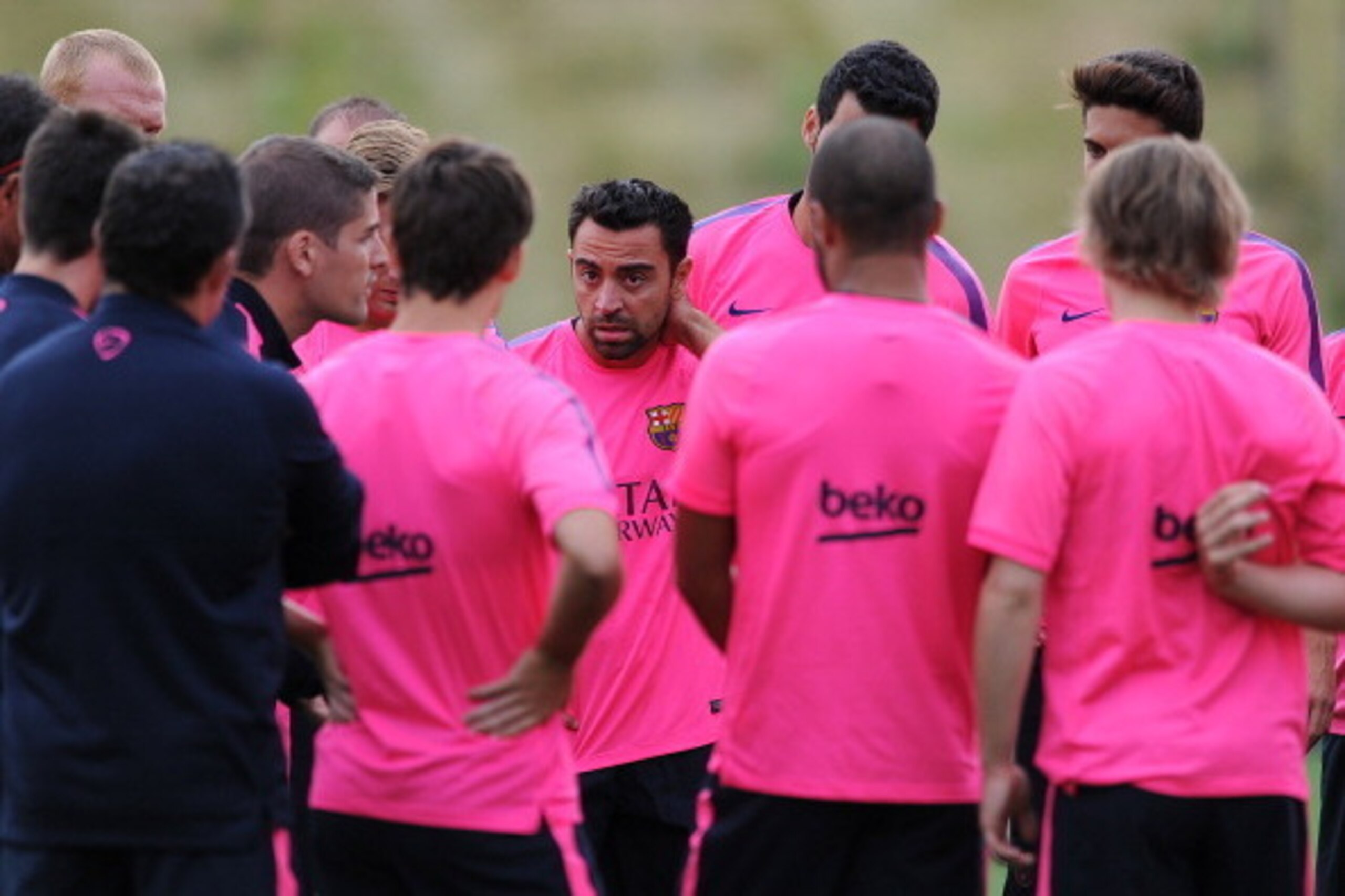 BURTON-UPON-TRENT, ENGLAND - JULY 28: Xavi of Barcelona looks on during the Barcelona Training Session at St George's Park on July 28, 2014 in Burton-upon-Trent, England. (Photo by Chris Brunskill/Getty Images)