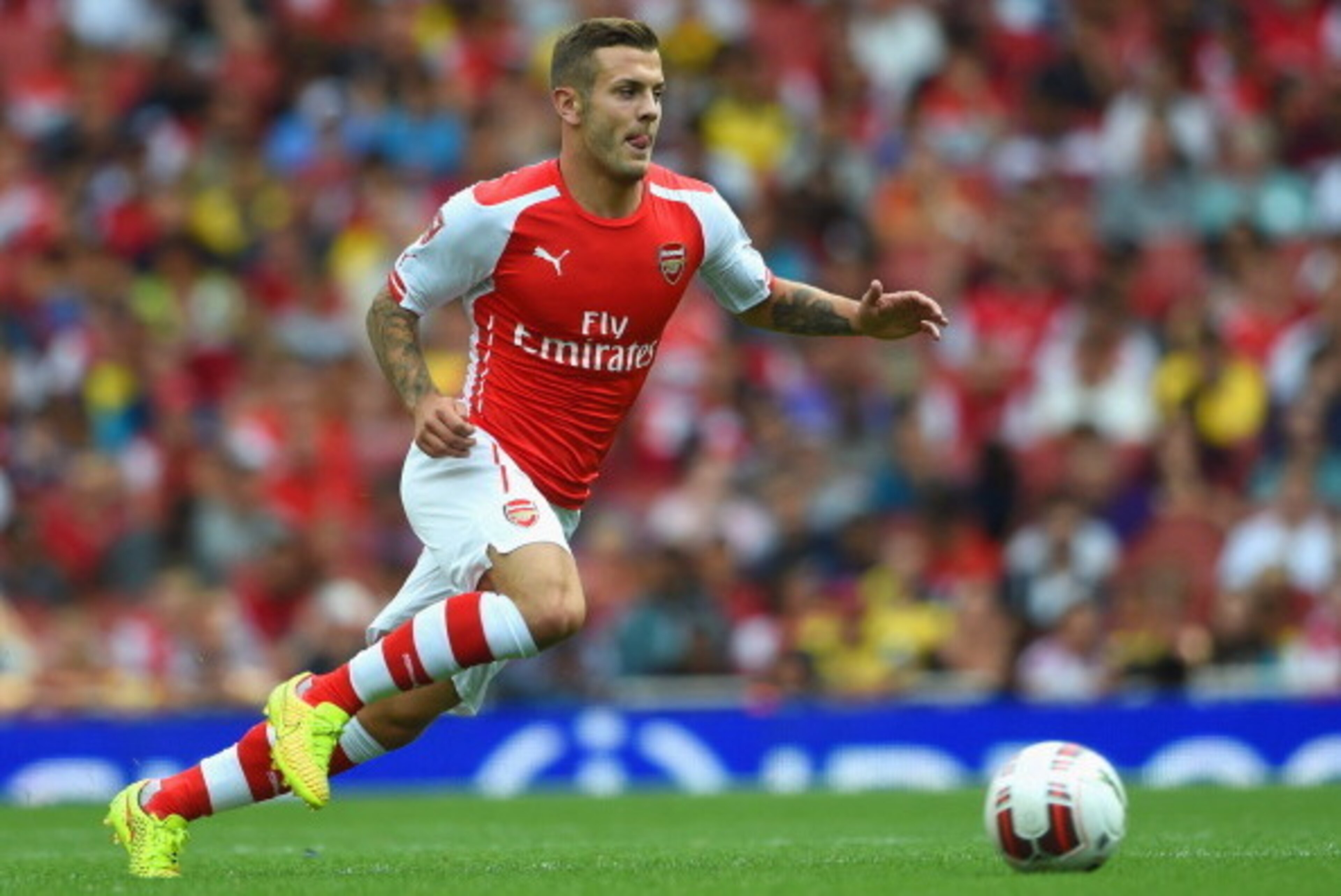 LONDON, ENGLAND - AUGUST 02:  Jack Wilshere of Arsenal in action during the Emirates Cup match between Arsenal and Benfica at the Emirates Stadium on August 2, 2014 in London, England.  (Photo by Michael Regan/Getty Images)