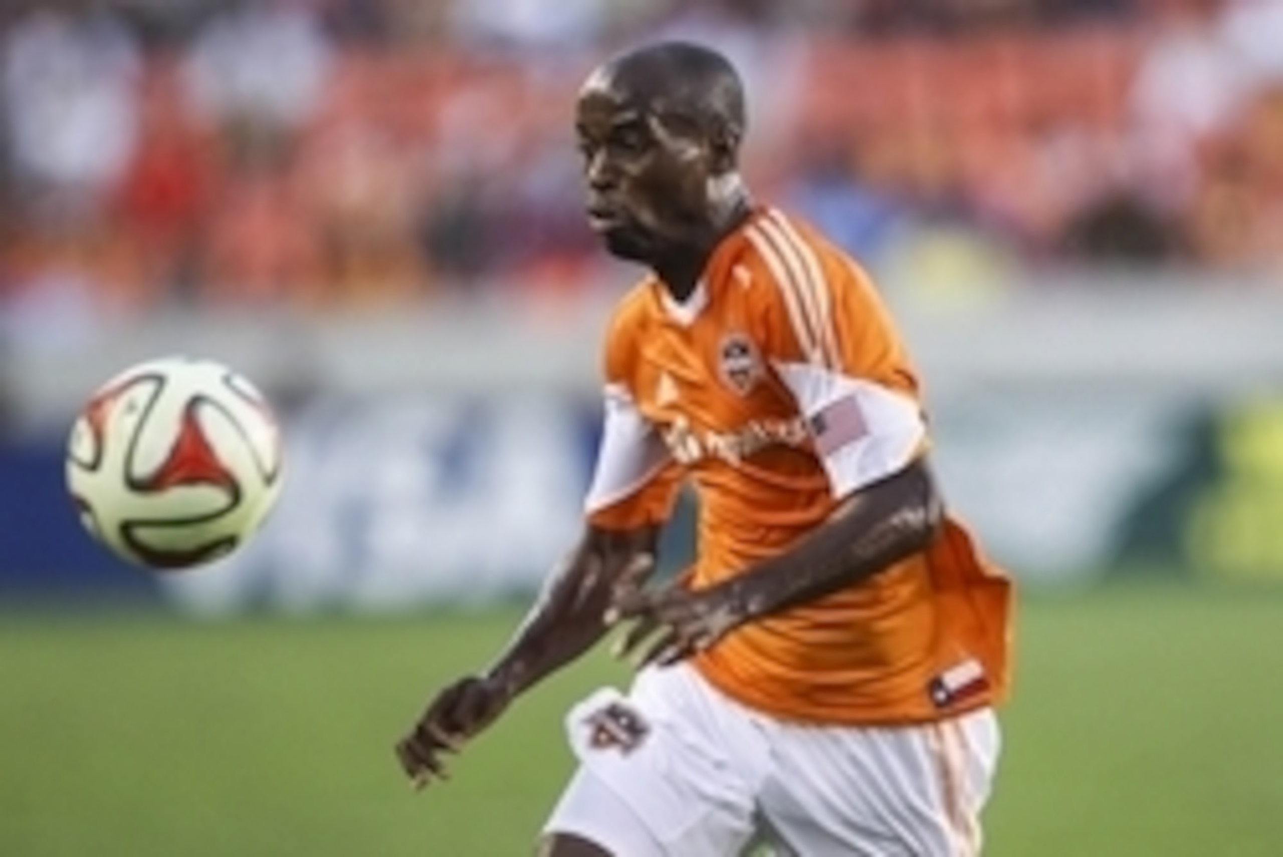 Aug 3, 2014; Houston, TX, USA; Houston Dynamo defender DaMarcus Beasley (21) chases the ball during the first half against D.C. United at BBVA Compass Stadium. Mandatory Credit: Troy Taormina-USA TODAY Sports