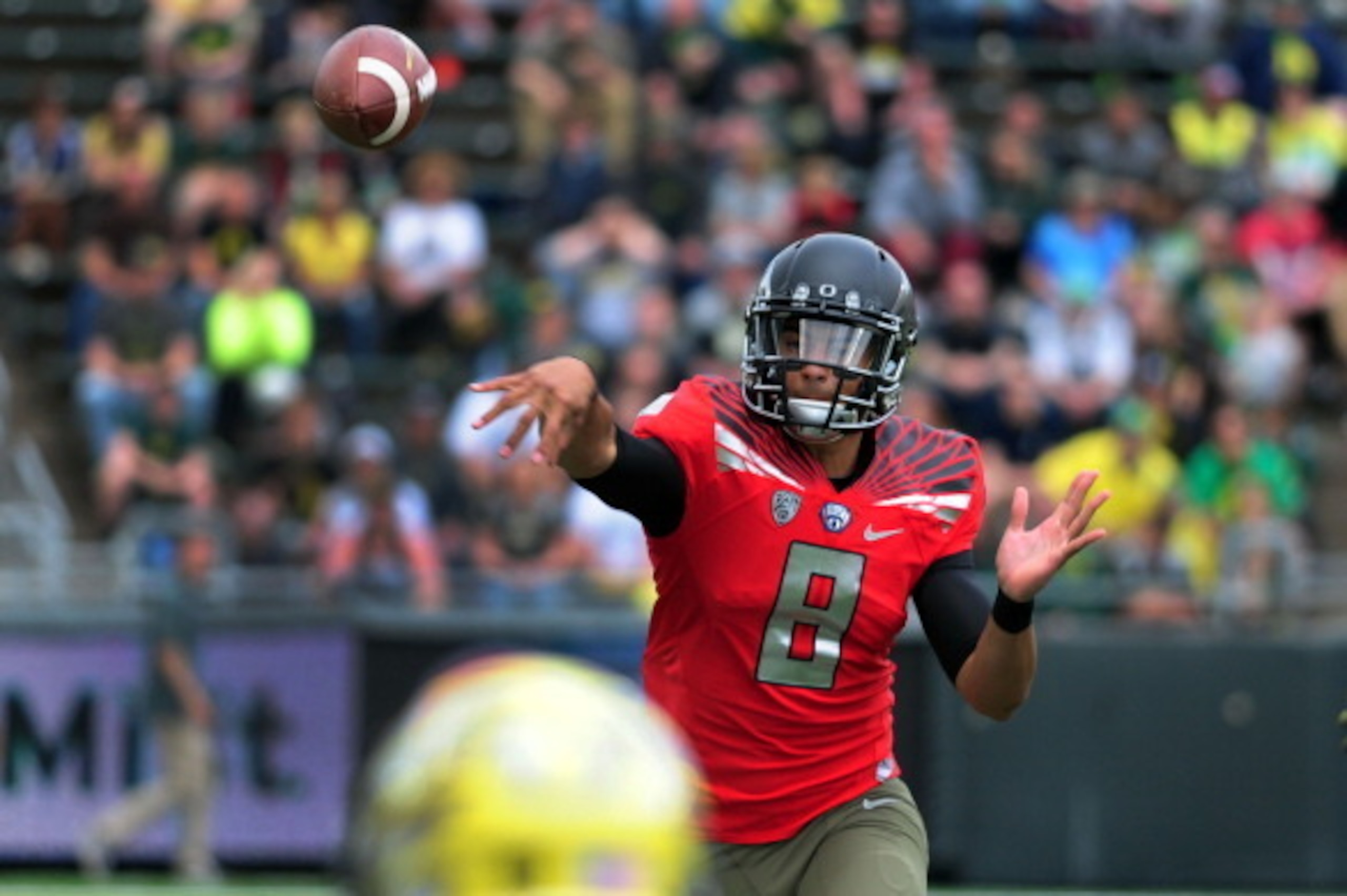 EUGENE, OR - MAY 3: Quarterback Marcus Mariota #8 of the Oregon Ducks passes the ball during the spring game at Autzen Stadium on May 3, 2014 in Eugene, Oregon. (Photo by Steve Dykes/Getty Images)