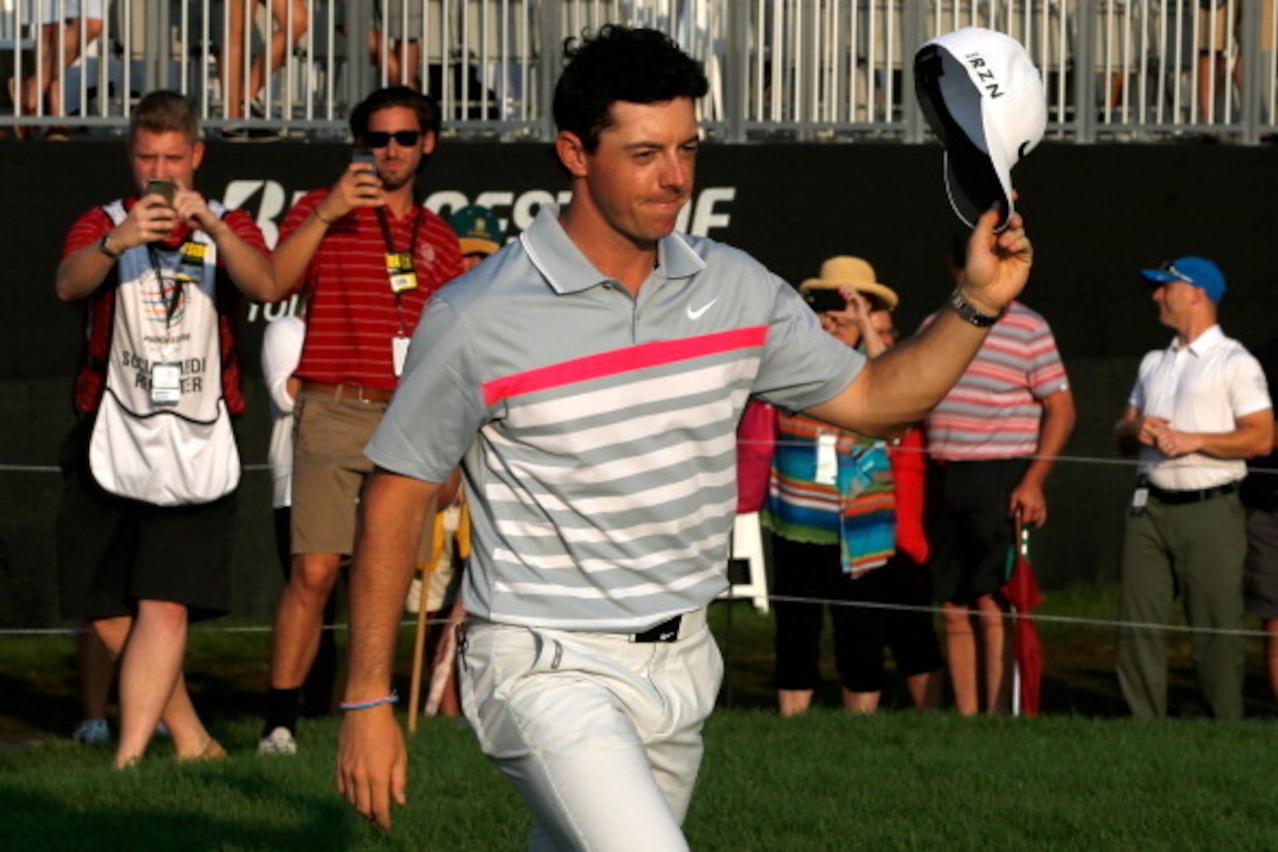 AKRON, OH - AUGUST 03: Rory McIlroy of Northern Ireland celebrates after winning the World Golf Championships-Bridgestone Invitational with a score of -15 during the final round at Firestone Country Club South Course on August 3, 2014 in Akron, Ohio. (P AKRON, OH - AUGUST 03: Rory McIlroy of Northern Ireland celebrates after winning the World Golf Championships-Bridgestone Invitational with a score of -15 during the final round at Firestone Country Club South Course on August 3, 2014 in Akron, Ohio. (P