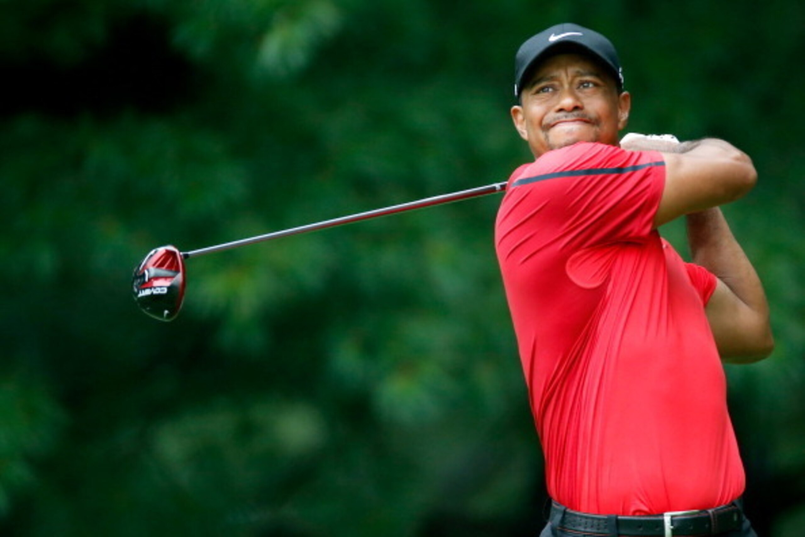 AKRON, OH - AUGUST 03:  Tiger Woods hits off the second tee during the final round of the World Golf Championships-Bridgestone Invitational at Firestone Country Club South Course on August 3, 2014 in Akron, Ohio.  (Photo by Gregory Shamus/Getty Images)