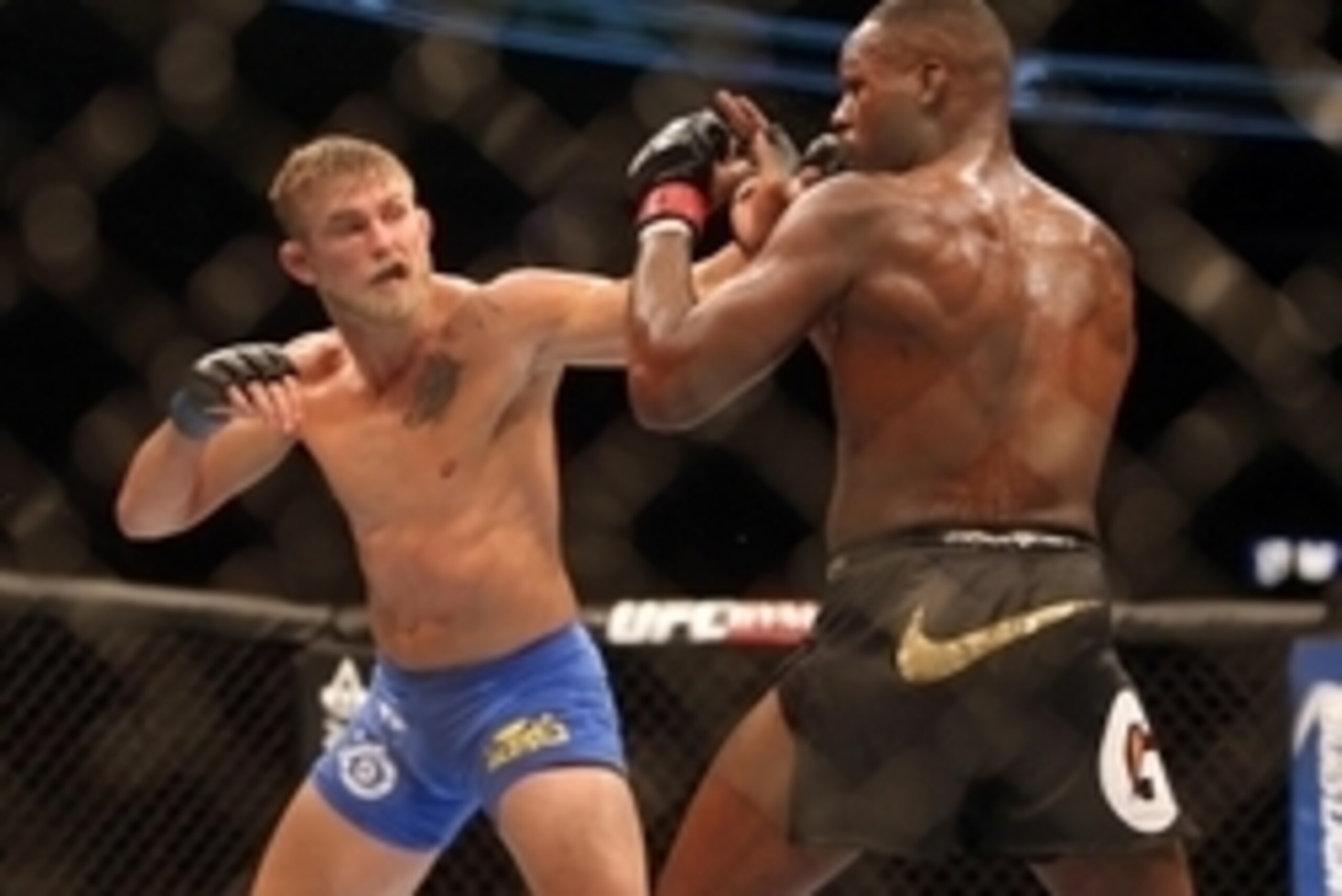 Sep 21, 2013; Toronto, Ontario, CAN; Alexander Gustafsson (left) fights Jon Jones during their Light Heavyweight Championship bout at UFC 165 at the Air Canada Centre. Mandatory Credit: Tom Szczerbowski-USA TODAY Sports