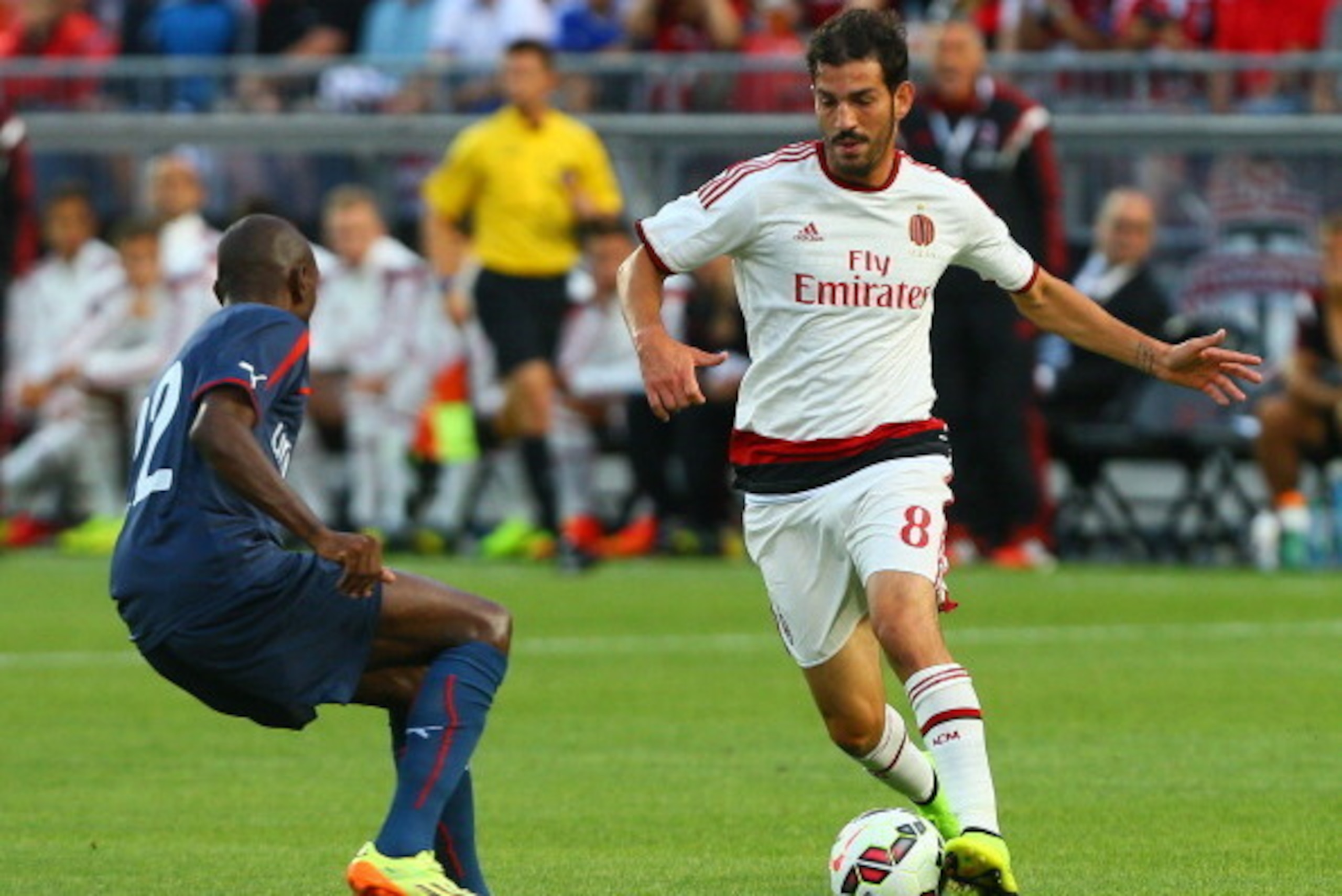 TORONTO, ON - JULY 24: Riccardo Sapanara #8 of AC Milan gets the ball past Dimitris Kolovos #12 of Olympiacos FC during International Champions Cup 2014 action at BMO Field July 24, 2014 in Toronto, Ontario, Canada.  (Photo by Abelimages/Getty Images)