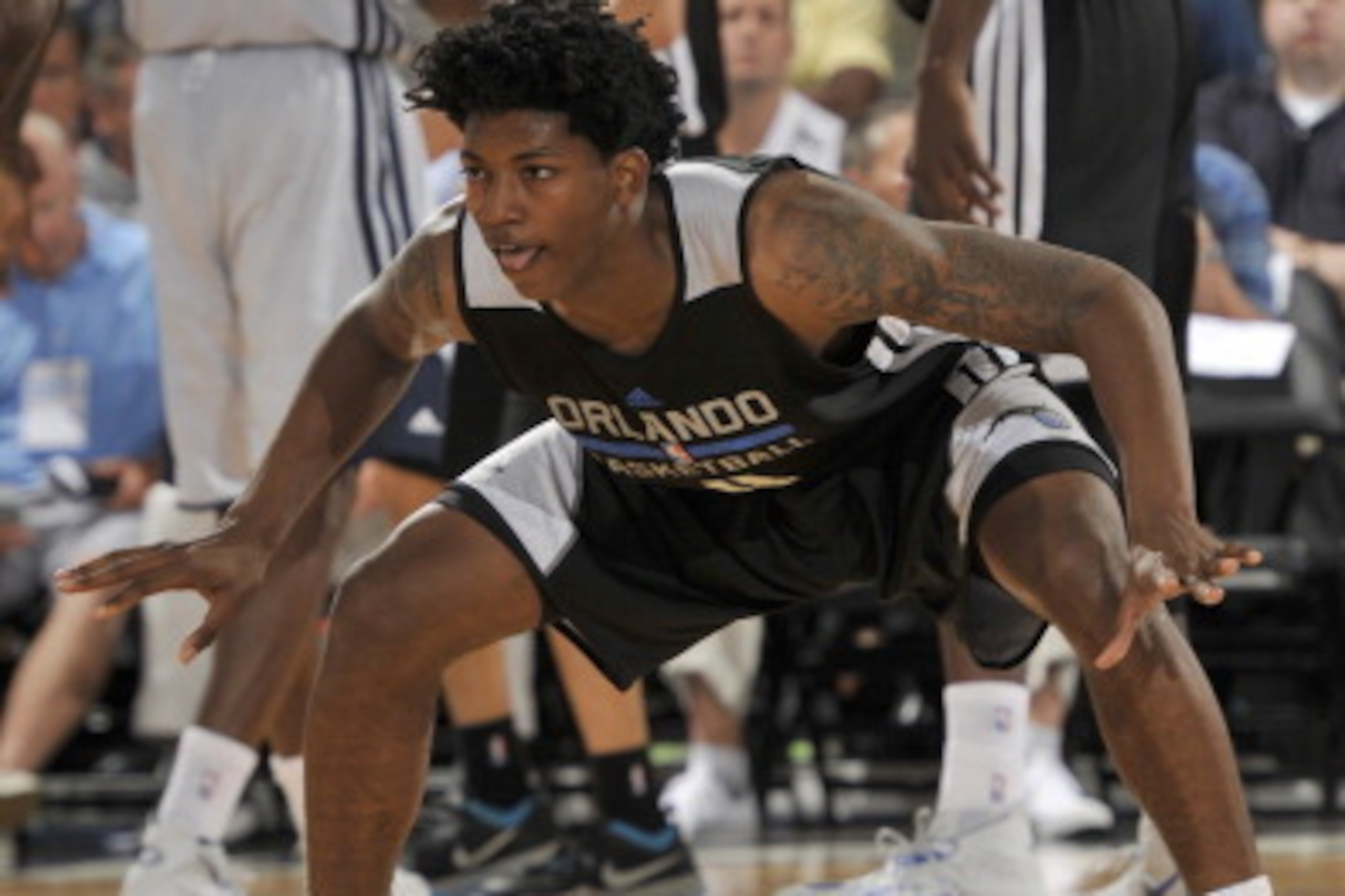 ORLANDO, FL - JULY 8: Elfrid Payton #4 of the Orlando Magic defends against the Memphis Grizzlies during the game during the Samsung NBA Summer League 2014 on July 8, 2014 at Amway Center in Orlando, Florida. NOTE TO USER: User expressly acknowledges and ORLANDO, FL - JULY 8: Elfrid Payton #4 of the Orlando Magic defends against the Memphis Grizzlies during the game during the Samsung NBA Summer League 2014 on July 8, 2014 at Amway Center in Orlando, Florida. NOTE TO USER: User expressly acknowledges and