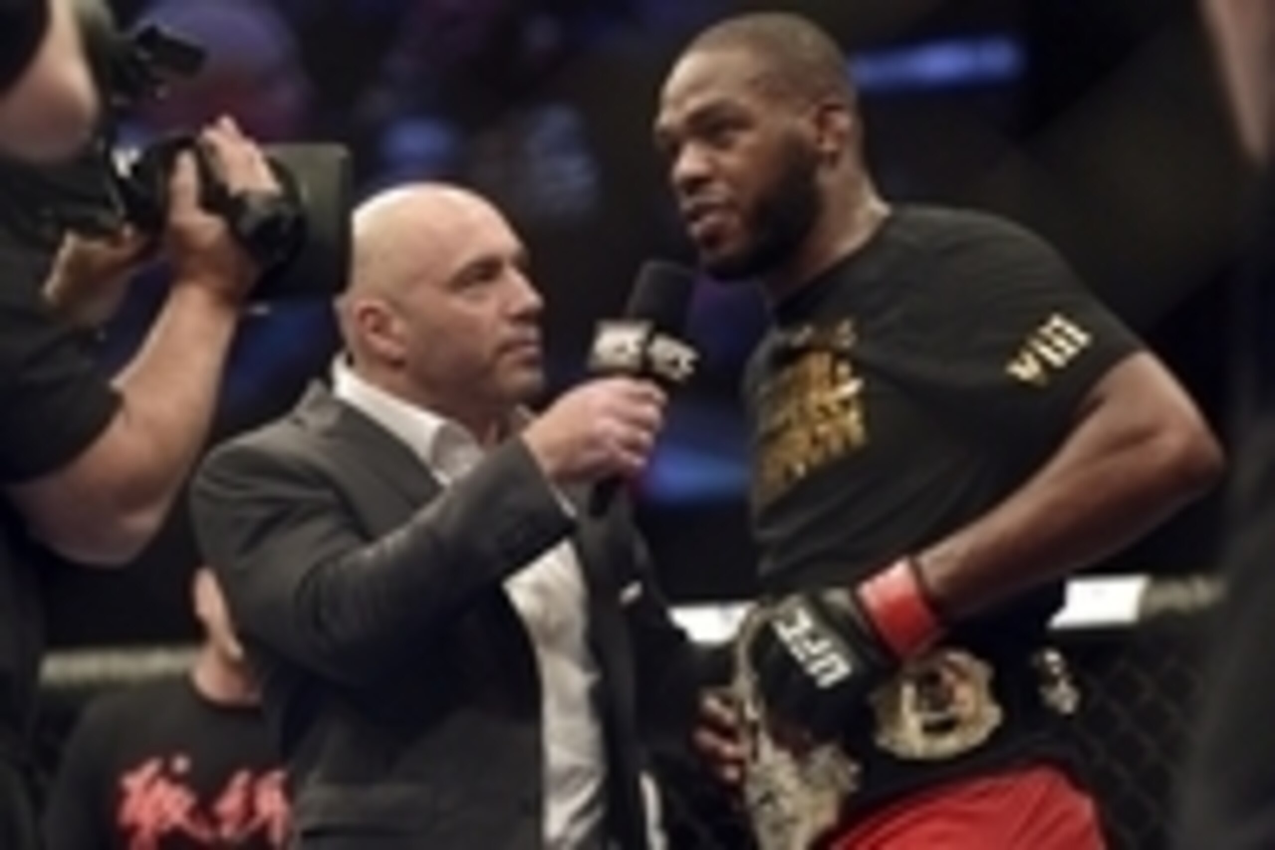 Apr 26, 2014; Baltimore, MD, USA;  Joe Rogan interviews Jon Jones after the UFC light heavy weight championship fight against Glover Teixeria at Baltimore Arena. Jones retained the light heavy height championship by defeating  Teixeria.  Mandatory Credit: