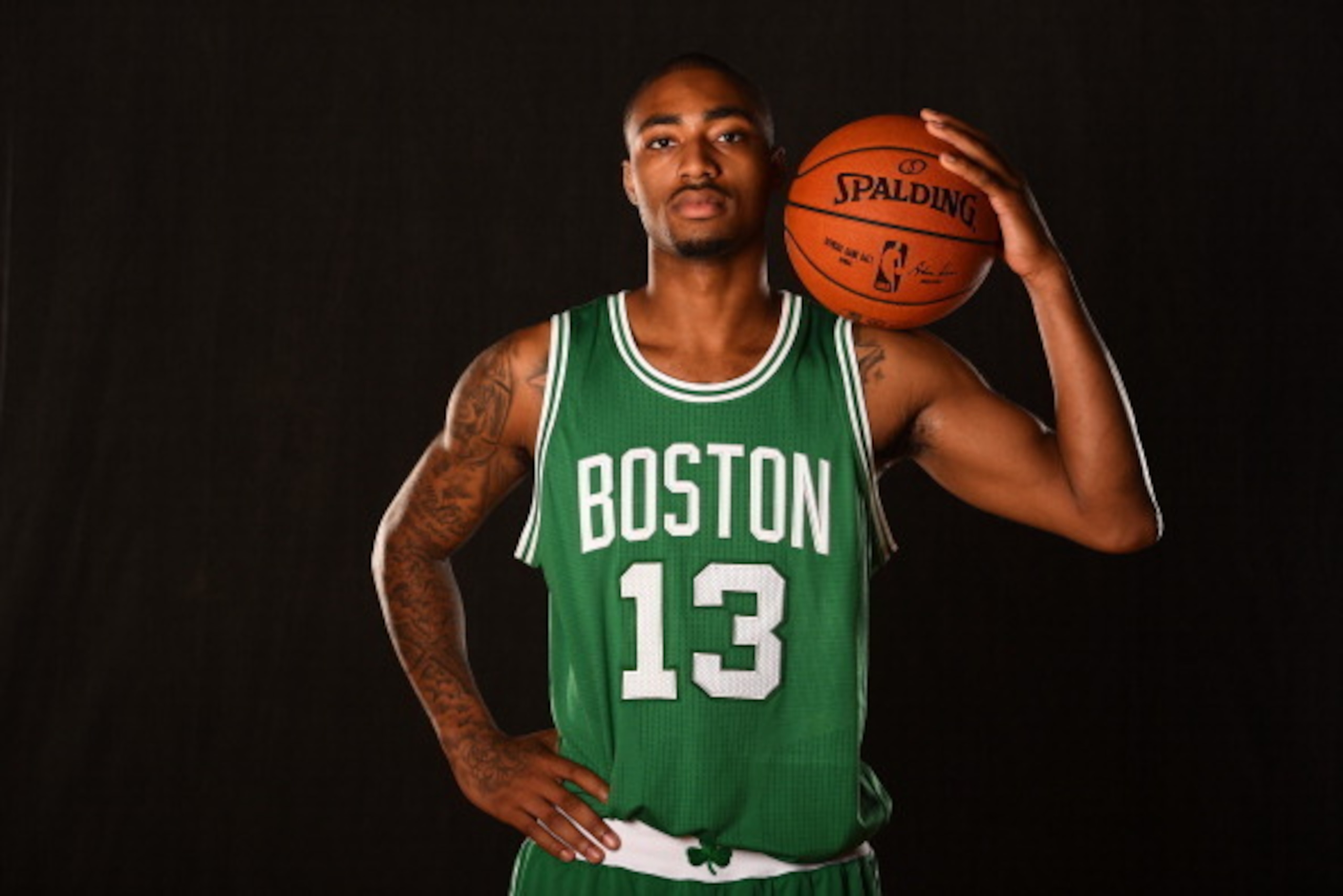 TARRYTOWN, NY - AUGUST 3:  James Young #13 of the Boston Celtics poses for a portrait during the 2014 NBA rookie photo shoot on August 3, 2014 at the Madison Square Garden Training Facility in Tarrytown, New York. NOTE TO USER: User expressly acknowledges