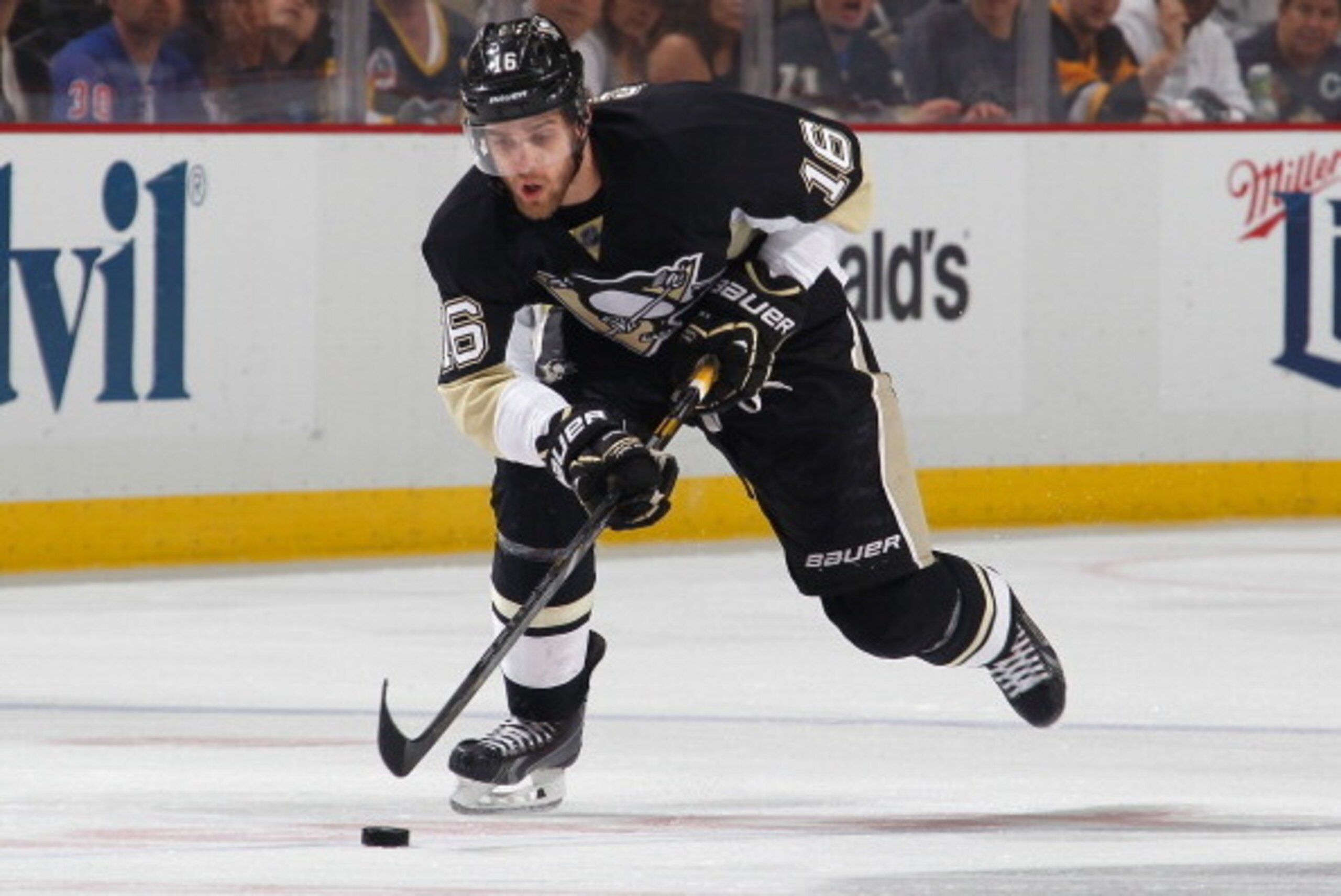 PITTSBURGH, PA - MAY 13:  Brandon Sutter #16 of the Pittsburgh Penguins moves the puck against the New York Rangers in Game Seven of the Second Round of the 2014 Stanley Cup Playoffs at Consol Energy Center on May 13, 2014 in Pittsburgh, Pennsylvania.  (P