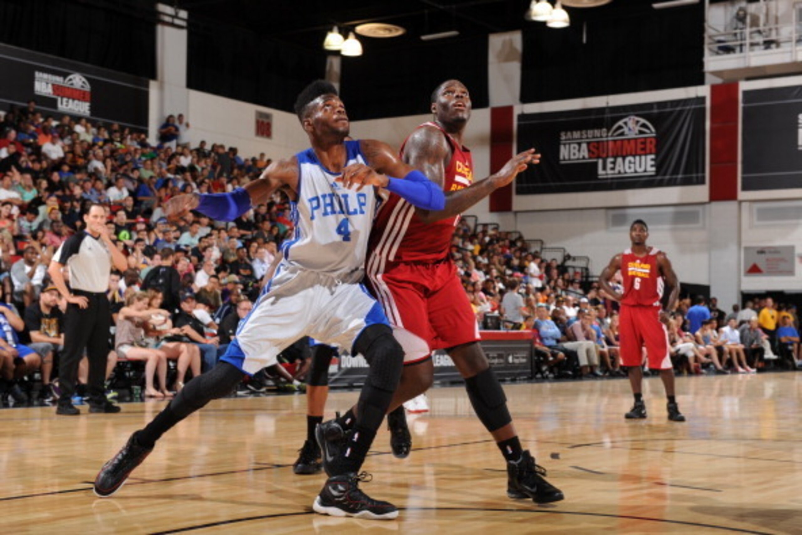 LAS VEGAS, NV - JULY 14:  Nerlens Noel #4 of the Philadelphia 76ers fights for position against Anthony Bennett #15 of the Cleveland Cavaliers during the Samsung NBA Summer League 2014  at the Cox Pavilion on July 14, 2014 in Las Vegas, Nevada. NOTE TO US