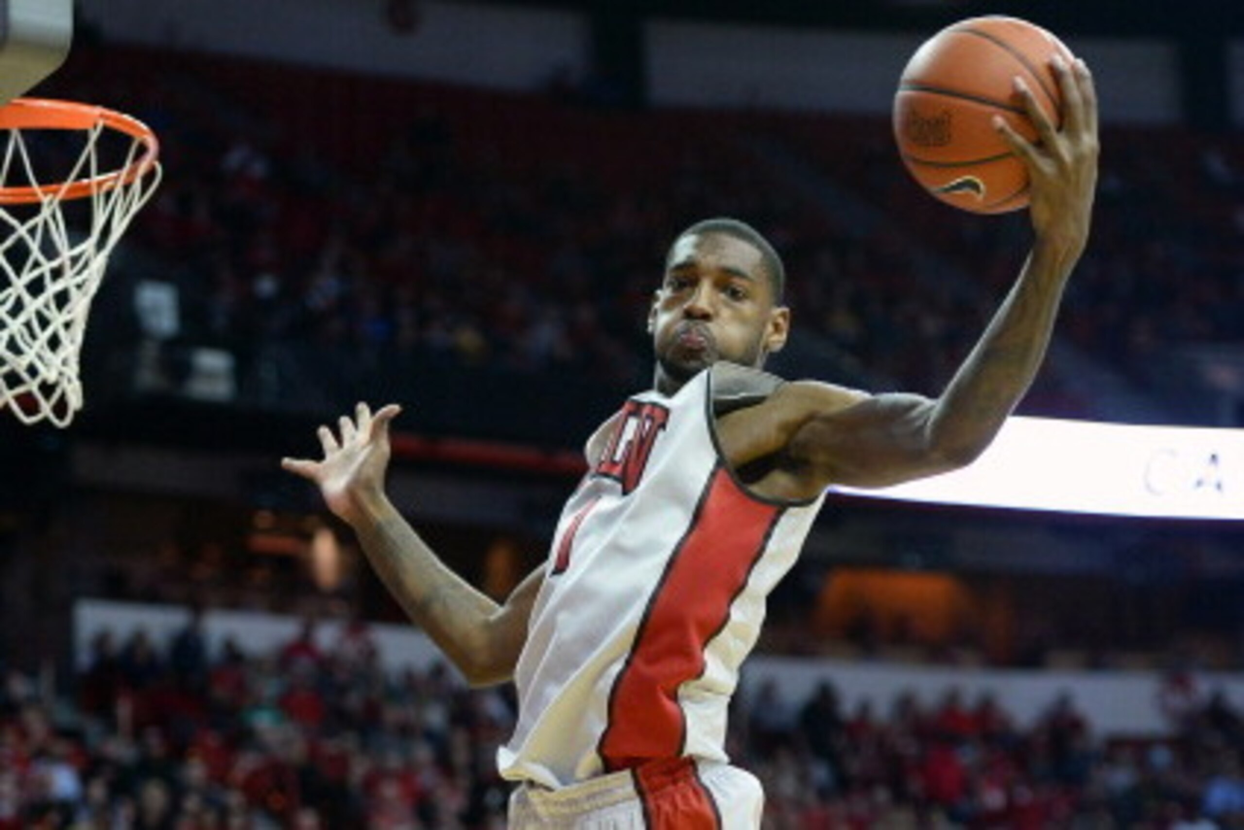 LAS VEGAS, NV - FEBRUARY 19:  Roscoe Smith #1 of the UNLV Rebels grabs a rebound during a game against the New Mexico Lobos at the Thomas & Mack Center on February 19, 2014 in Las Vegas, Nevada. New Mexico won 68-56.  (Photo by Ethan Miller/Getty Images)