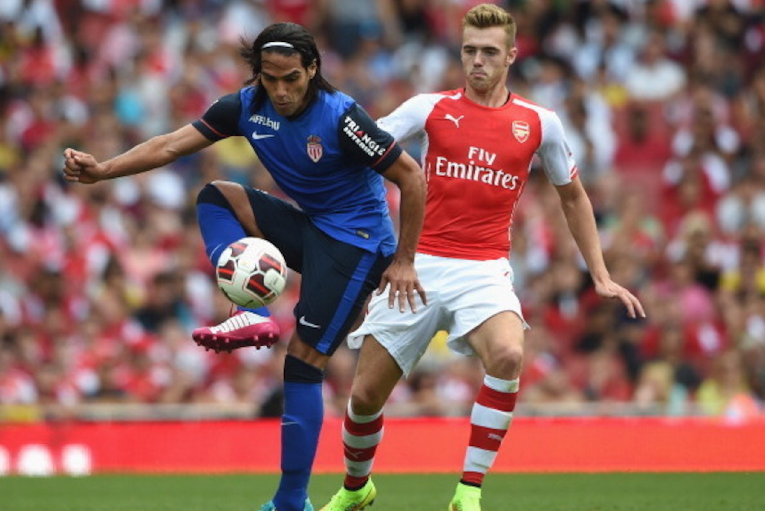 LONDON, ENGLAND - AUGUST 03:  Radamel Falcao of Monaco in action with Calum Chambers during the Emirates Cup match between Arsenal and AS Monaco at the Emirates Stadium on August 3, 2014 in London, England.  (Photo by Michael Regan/Getty Images)