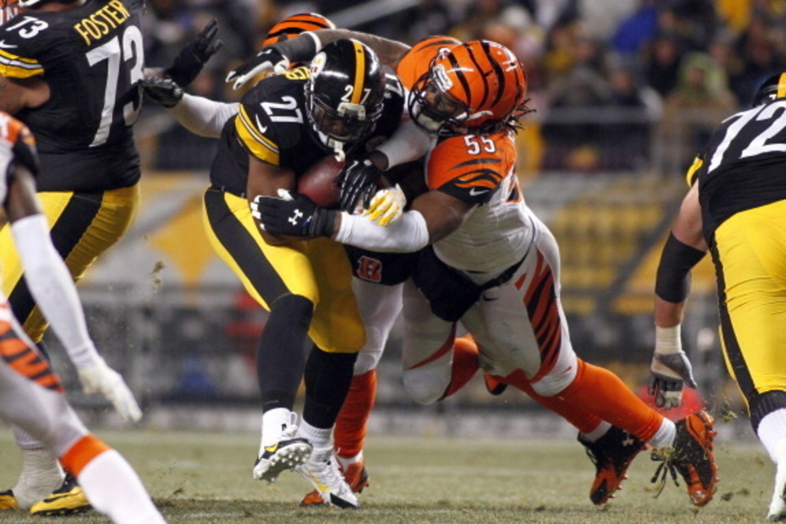 PITTSBURGH, PA - DECEMBER 15:  Vontaze Burfict #55 of the Cincinnati Bengals tackles Jonathan Dwyer #27 of the Pittsburgh Steelers during the game on December 15, 2013 at Heinz Field in Pittsburgh, Pennsylvania.  (Photo by Justin K. Aller/Getty Images)