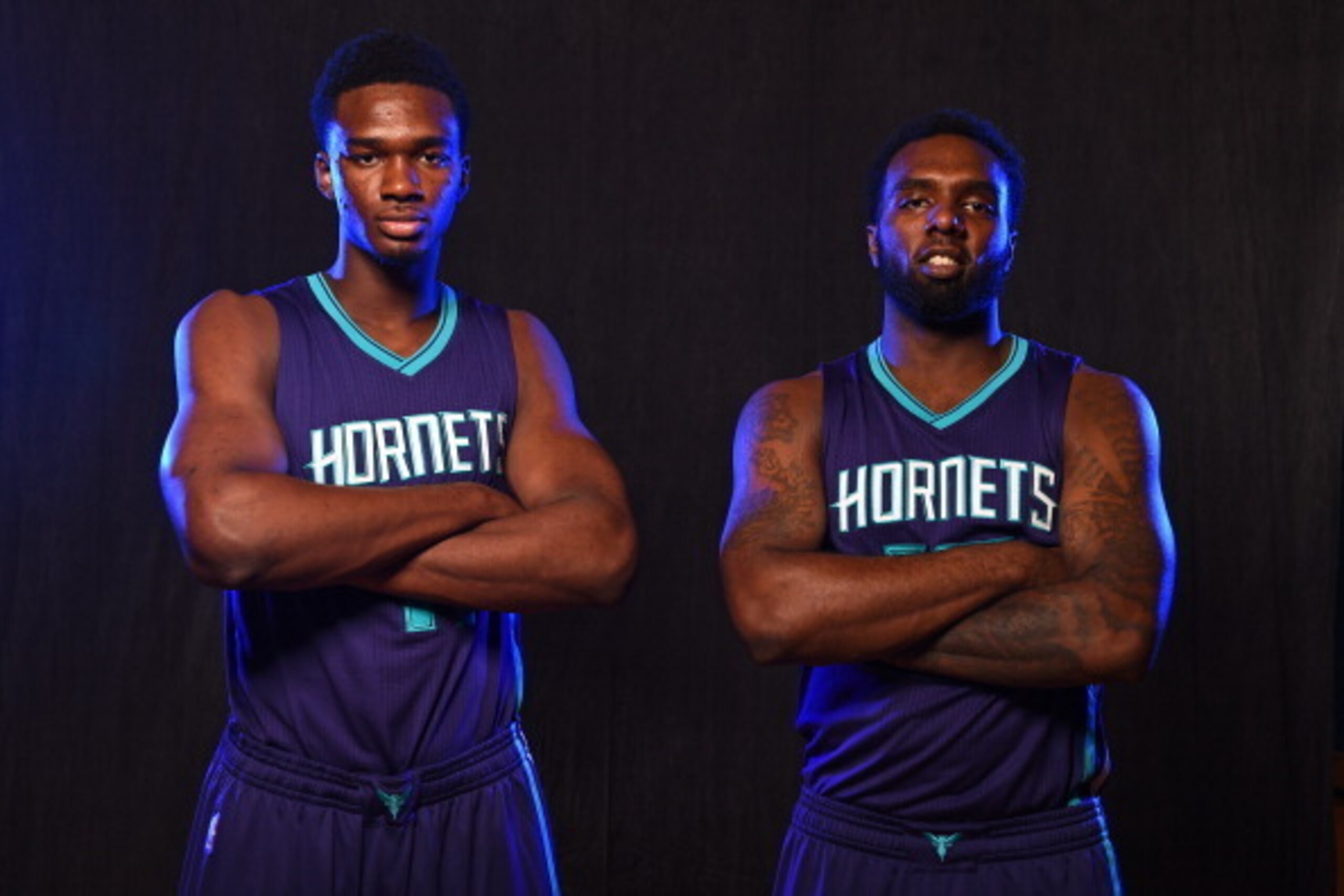 TARRYTOWN, NY - AUGUST 3: (L-R) Noah Vonleh #11 and P.J. Hairston #19 of the Charlotte Hornets poses for a portrait during the 2014 NBA rookie photo shoot on August 3, 2014 at the Madison Square Garden Training Facility in Tarrytown, New York. NOTE TO USE TARRYTOWN, NY - AUGUST 3: (L-R) Noah Vonleh #11 and P.J. Hairston #19 of the Charlotte Hornets poses for a portrait during the 2014 NBA rookie photo shoot on August 3, 2014 at the Madison Square Garden Training Facility in Tarrytown, New York. NOTE TO USE