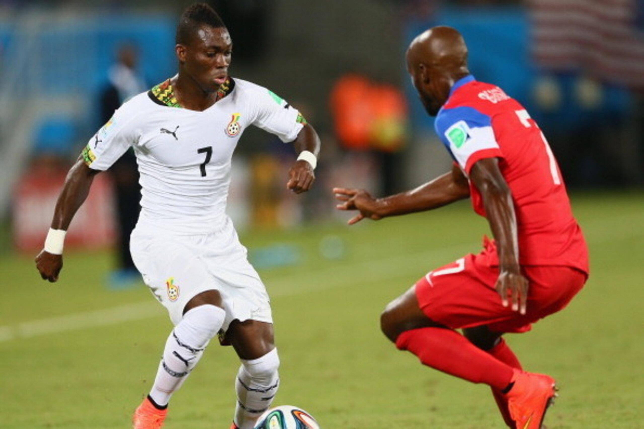 NATAL, BRAZIL - JUNE 16: Christian Atsu of Ghana controls the ball against DaMarcus Beasley of the United States during the 2014 FIFA World Cup Brazil Group G match between Ghana and the United States at Estadio das Dunas on June 16, 2014 in Natal, Brazil