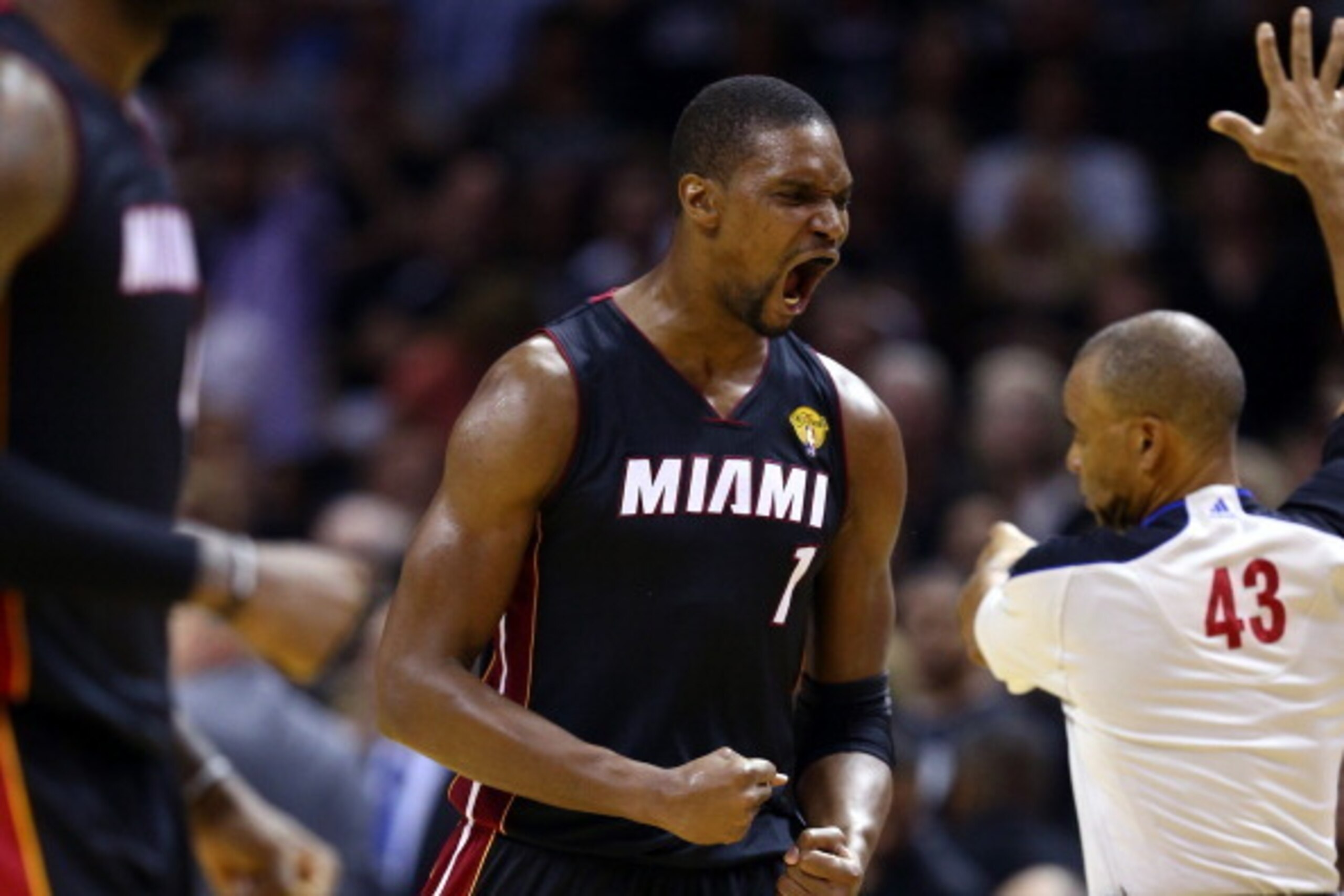 SAN ANTONIO, TX - JUNE 08:  Chris Bosh #1 of the Miami Heat reacts against the San Antonio Spurs during Game Two of the 2014 NBA Finals at the AT&T Center on June 8, 2014 in San Antonio, Texas. The Miami Heat defeated the San Antonio Spurs 98-96. NOTE TO 