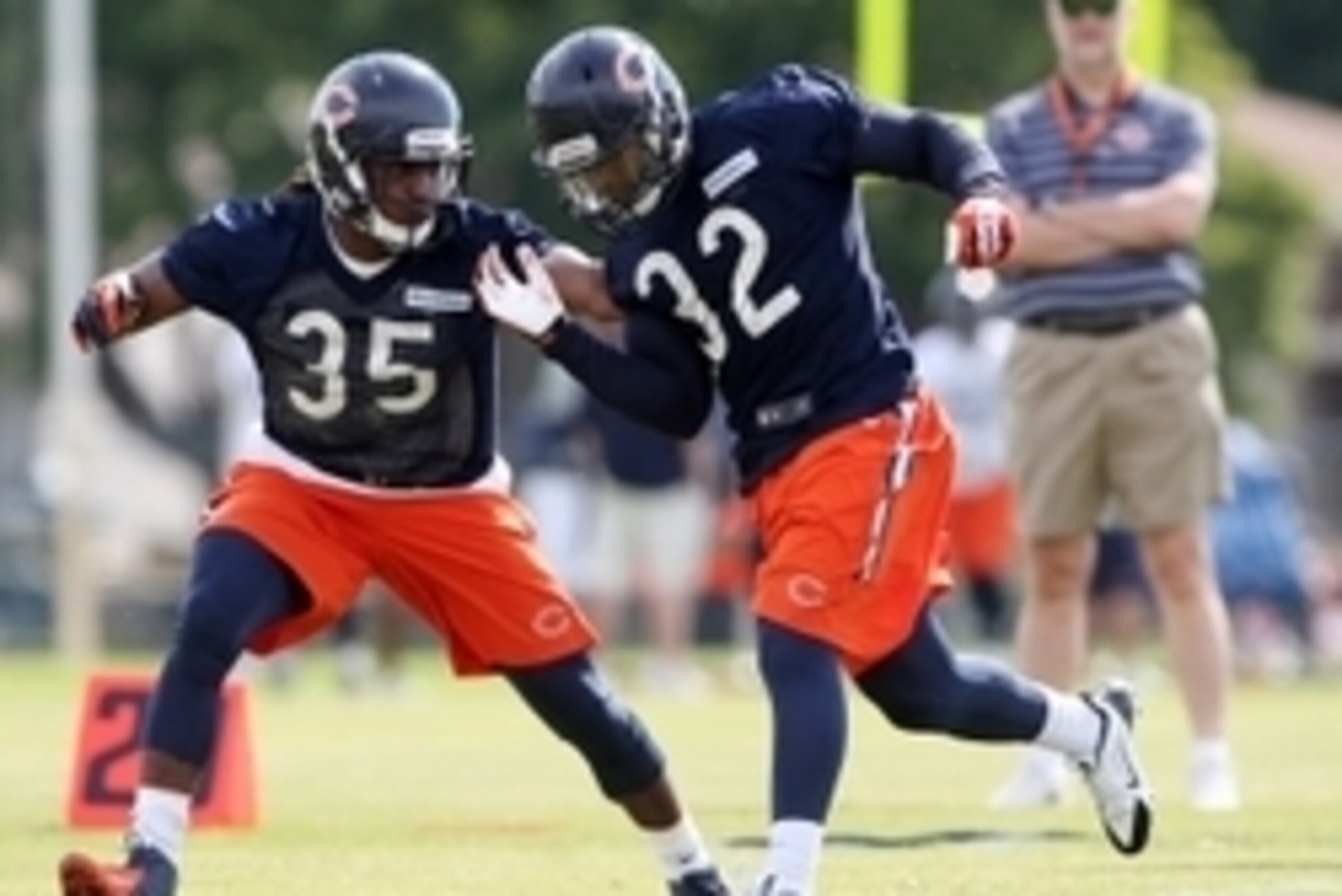 Jul 25, 2014; Chicago, IL, USA; Chicago Bears running backs Senorise Perry (35) and Michael Ford (32) go through drills during training camp at Olivet Nazarene University. Mandatory Credit: Jerry Lai-USA TODAY Sports