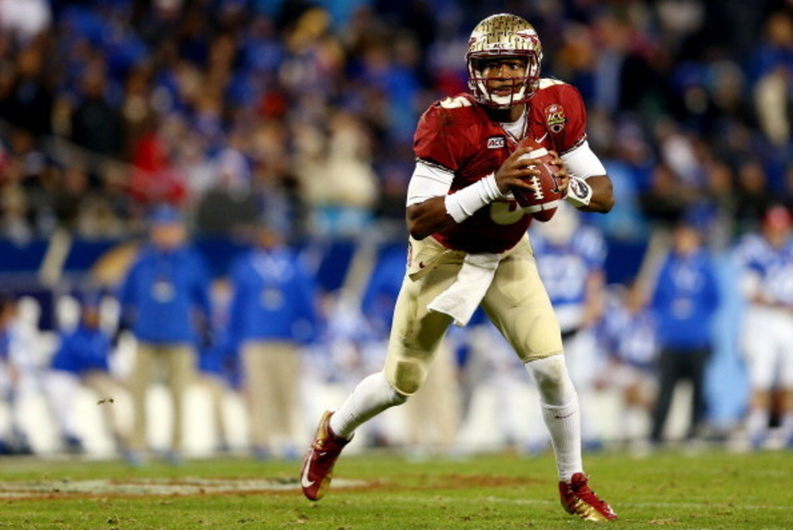 CHARLOTTE, NC - DECEMBER 07:  Quarterback Jameis Winston #5 of the Florida State Seminoles looks to pass against the Duke Blue Devils during the ACC Championship game at Bank of America Stadium on December 7, 2013 in Charlotte, North Carolina.  (Photo by 