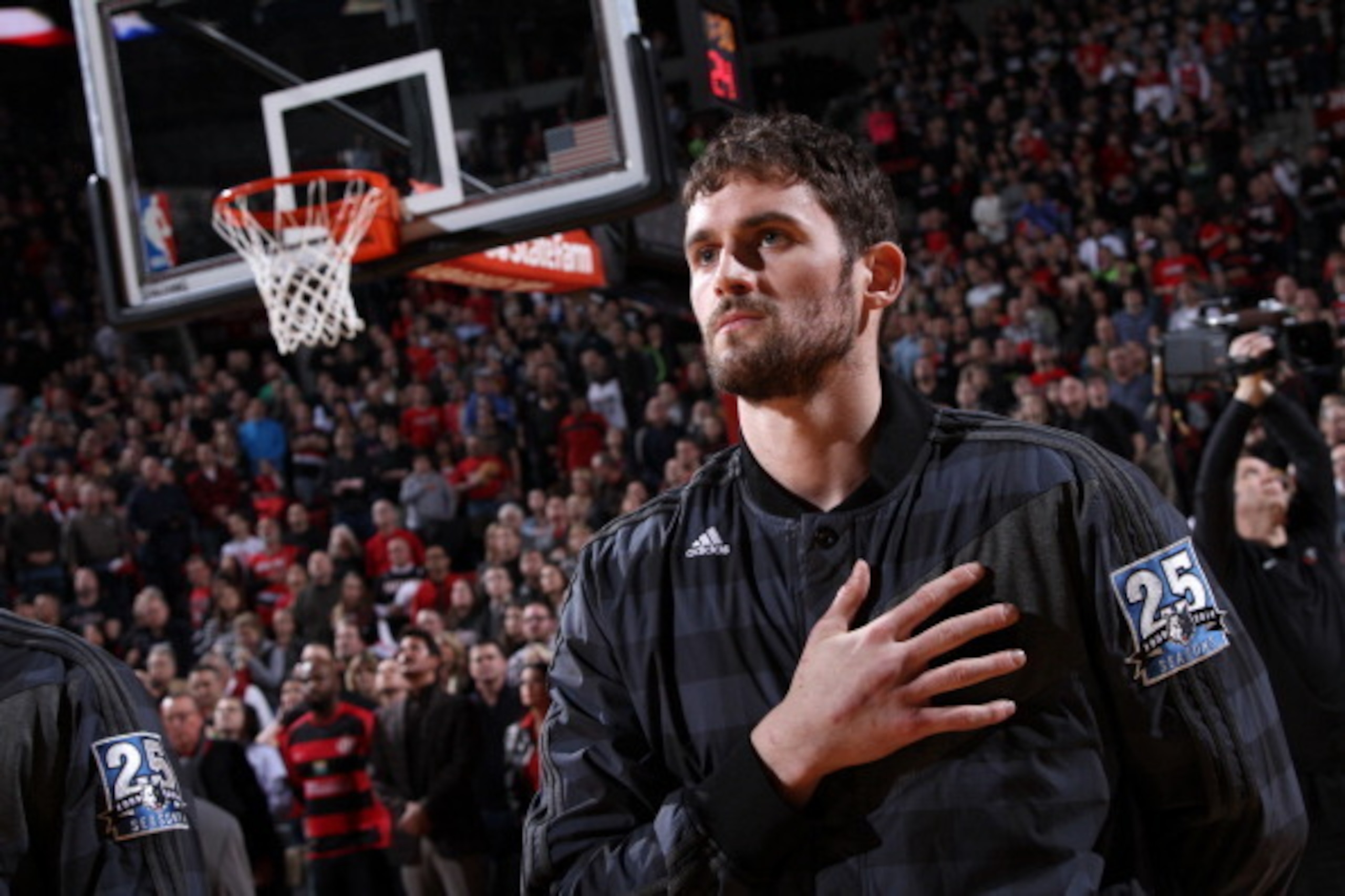 PORTLAND, OR - JANUARY 25:  Kevin Love #42 of the Minnesota Timberwolves stands on the court before the game against the Portland Trail Blazers on January 25, 2014 at the Moda Center Arena in Portland, Oregon. NOTE TO USER: User expressly acknowledges and