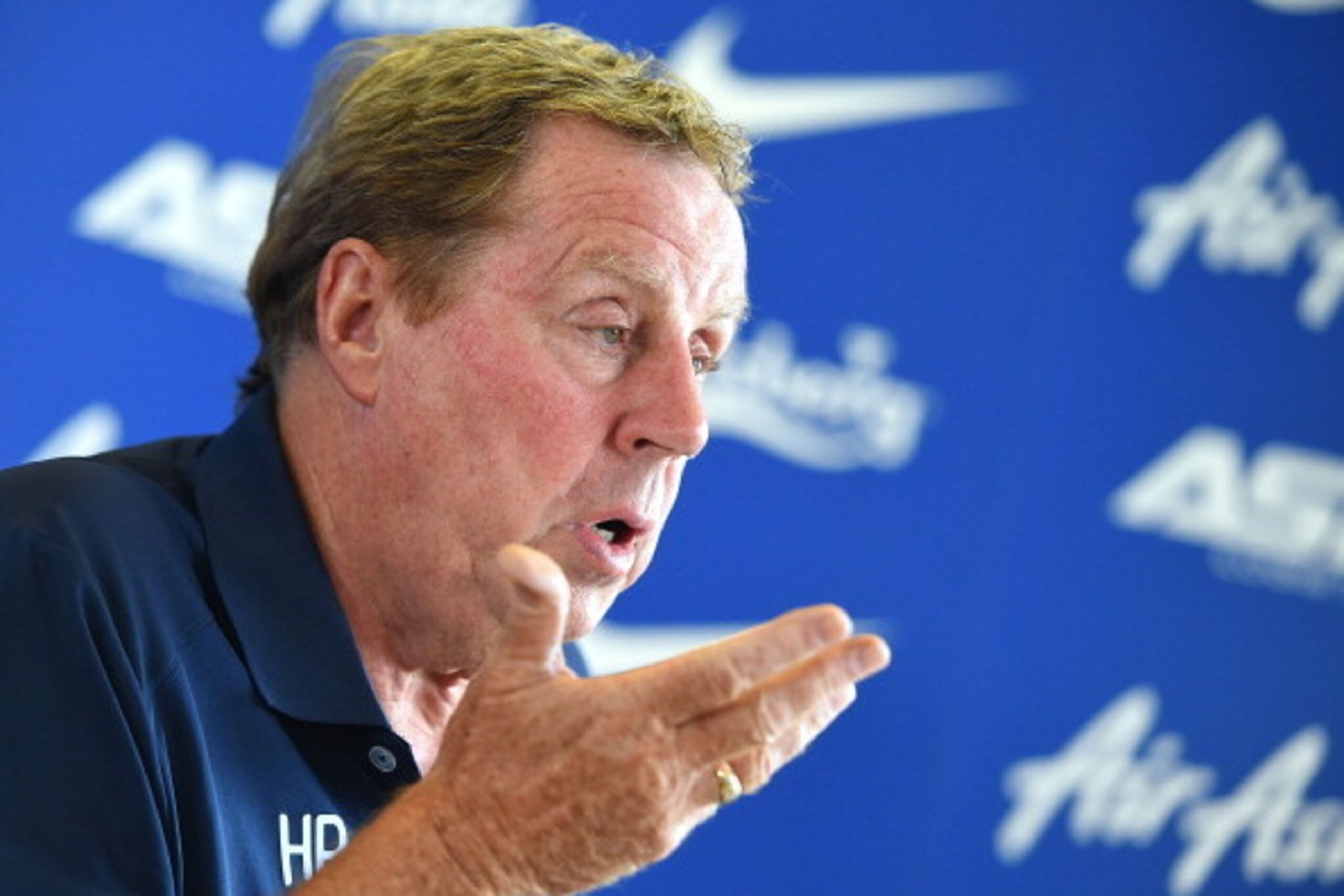 HARLINGTON, ENGLAND - JULY 18:  Manager of Queens Park Rangers Harry Redknapp speaks to the media during a Queens Park Rangers press conference on July 18, 2014 in Harlington, England.  (Photo by Tom Dulat/Getty Images)