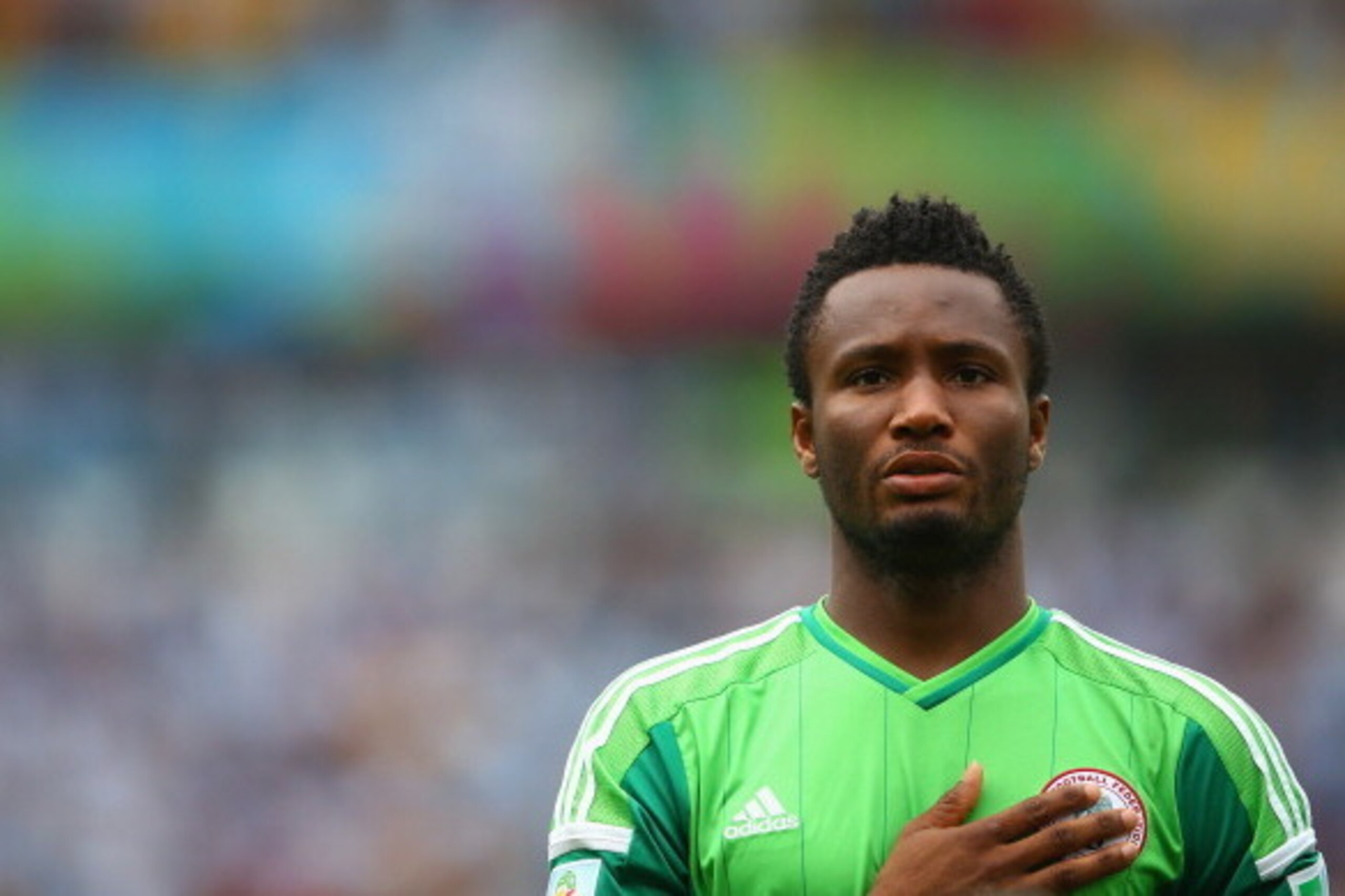 PORTO ALEGRE, BRAZIL - JUNE 25: John Obi Mikel of Nigeria looks on during the National Anthem prior to the 2014 FIFA World Cup Brazil Group F match between Nigeria and Argentina at Estadio Beira-Rio on June 25, 2014 in Porto Alegre, Brazil. (Photo by Pa PORTO ALEGRE, BRAZIL - JUNE 25: John Obi Mikel of Nigeria looks on during the National Anthem prior to the 2014 FIFA World Cup Brazil Group F match between Nigeria and Argentina at Estadio Beira-Rio on June 25, 2014 in Porto Alegre, Brazil. (Photo by Pa