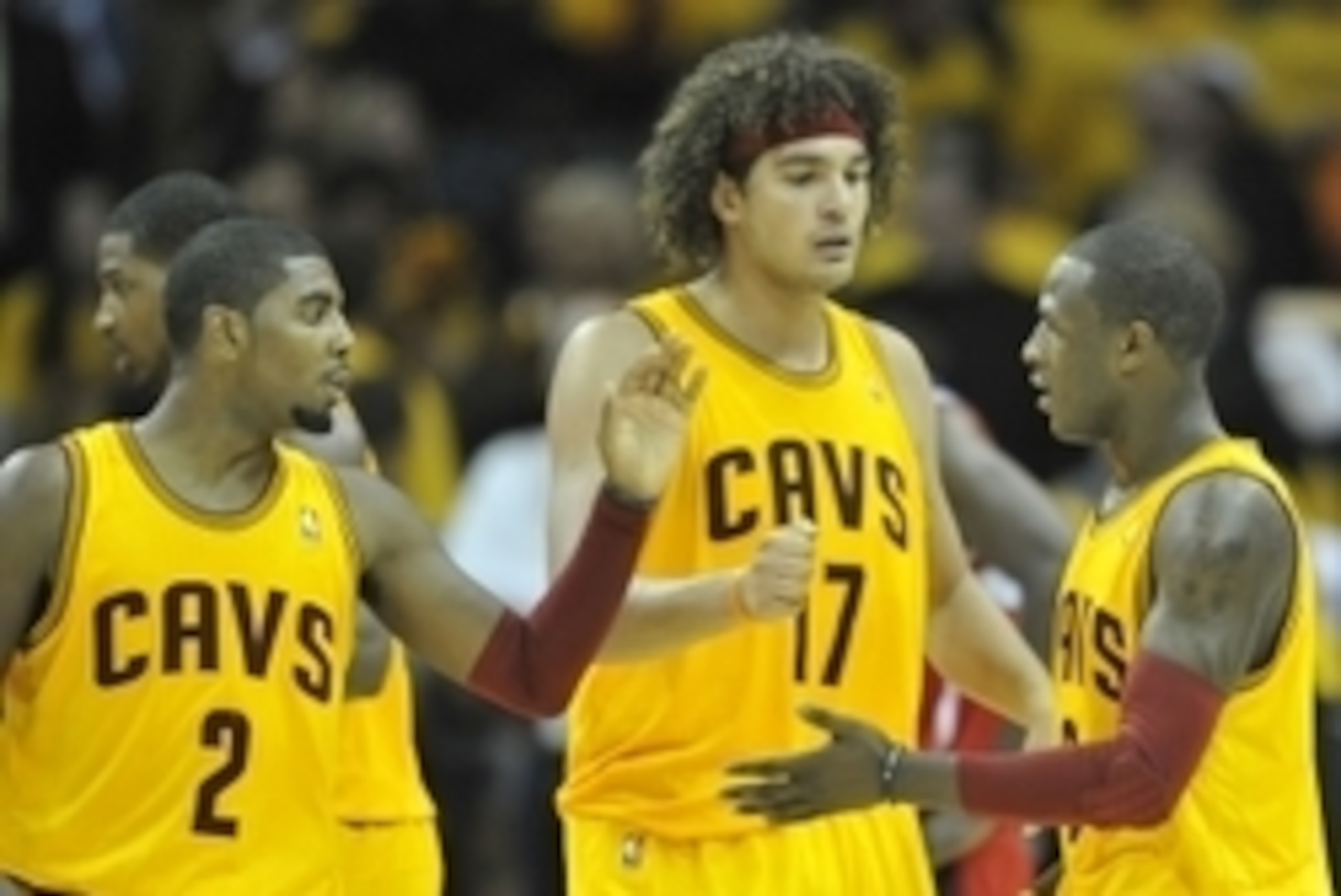 Oct 30, 2012; Cleveland, OH, USA; Cleveland Cavaliers point guard Kyrie Irving (2), center Anderson Varejao (17) and shooting guard Dion Waiters (3) celebrate in the fourth quarter against the Washington Wizards at Quicken Loans Arena. Mandatory Credit: D