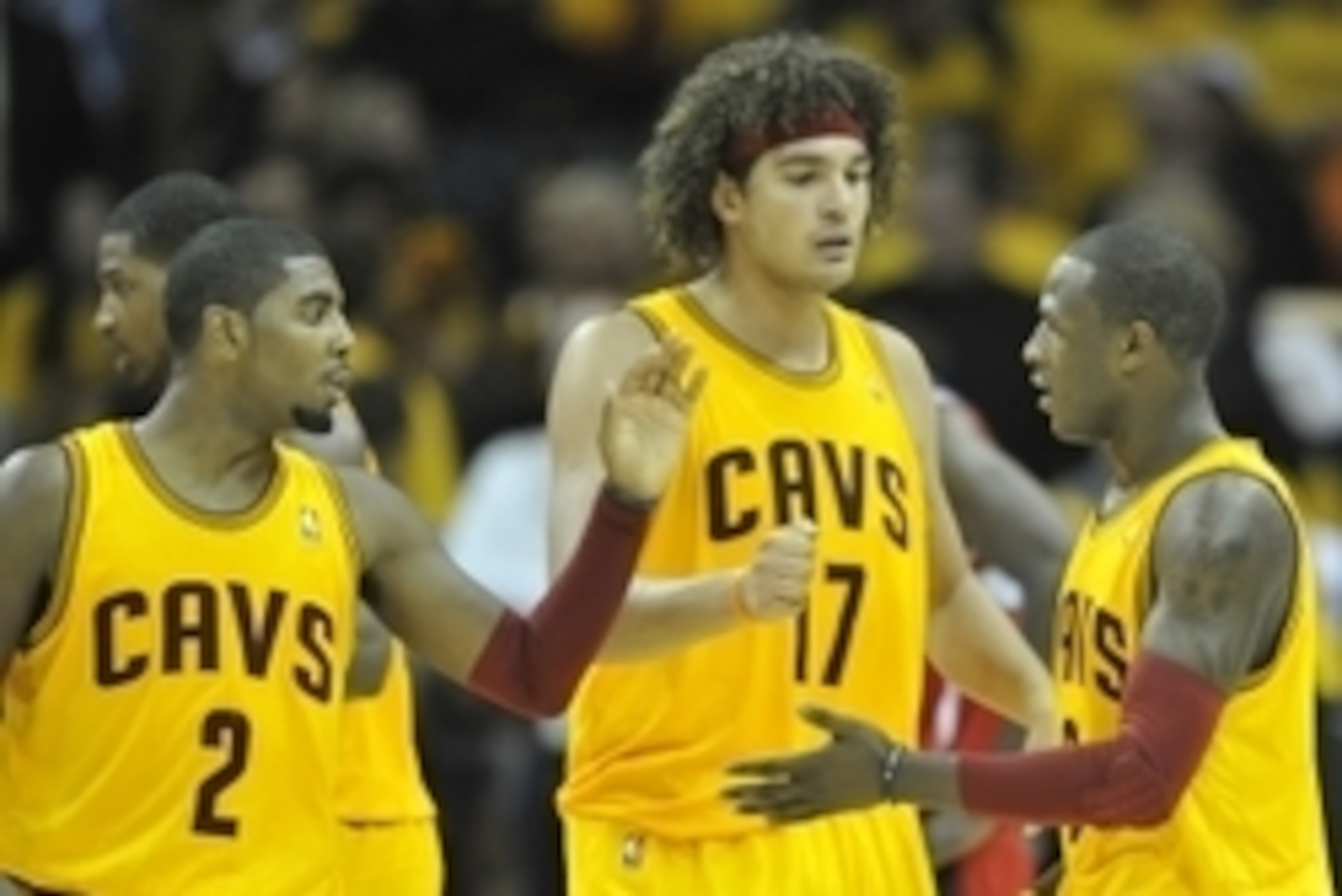 Oct 30, 2012; Cleveland, OH, USA; Cleveland Cavaliers point guard Kyrie Irving (2), center Anderson Varejao (17) and shooting guard Dion Waiters (3) celebrate in the fourth quarter against the Washington Wizards at Quicken Loans Arena. Mandatory Credit: D