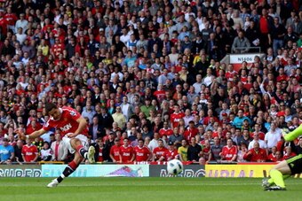 MANCHESTER, ENGLAND - MAY 08: Javier Hernandez of Manchester United scores the opening goal during the Barclays Premier League match between Manchester United and Chelsea at Old Trafford on May 8, 2011 in Manchester, England.  (Photo by Alex Livesey/Getty