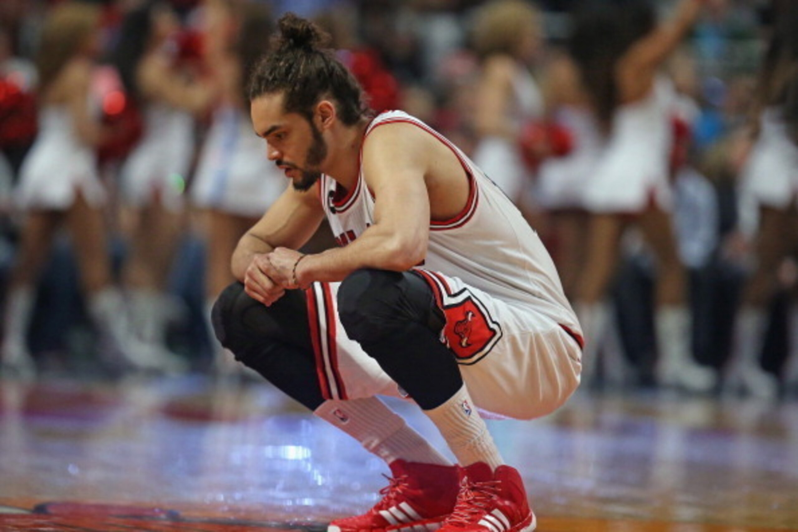 CHICAGO, IL - APRIL 14: Joakim Noah #13 of the Chicago Bulls takes a moment to himself before the start of a game against the Orlando Magic at the United Center on April 14, 2014 in Chicago, Illinois. The Bulls defeated the Magic 108-95. NOTE TO USER: Use CHICAGO, IL - APRIL 14: Joakim Noah #13 of the Chicago Bulls takes a moment to himself before the start of a game against the Orlando Magic at the United Center on April 14, 2014 in Chicago, Illinois. The Bulls defeated the Magic 108-95. NOTE TO USER: Use