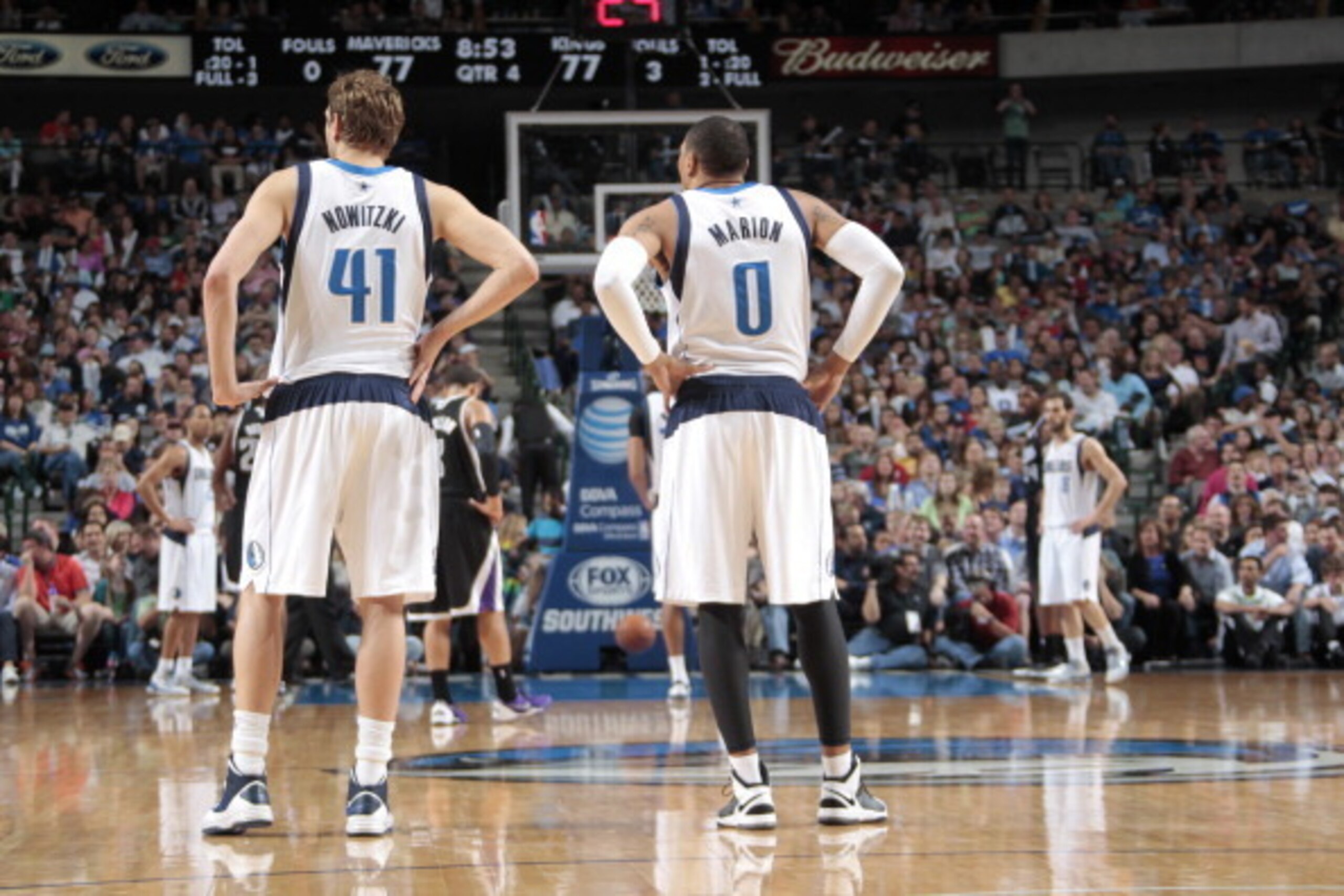DALLAS, TX - MARCH 29: Dirk Nowitzki #41 and Shawn Marion #0 of the Dallas Mavericks on the court during the game against the Sacramento Kings on March 29, 2014 at the American Airlines Center in Dallas, Texas. NOTE TO USER: User expressly acknowledges an
