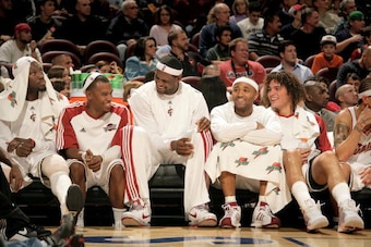 CLEVELAND - DECEMBER 9: Ben Wallace #4, Daniel Gibson #1, LeBron James #23, Mo Williams #2 and Anderson Varejao #17 of the Cleveland Cavaliers share a laugh on the bench with a big lead in the fourth quarter against the Toronto Raptors at The Quicken Loan