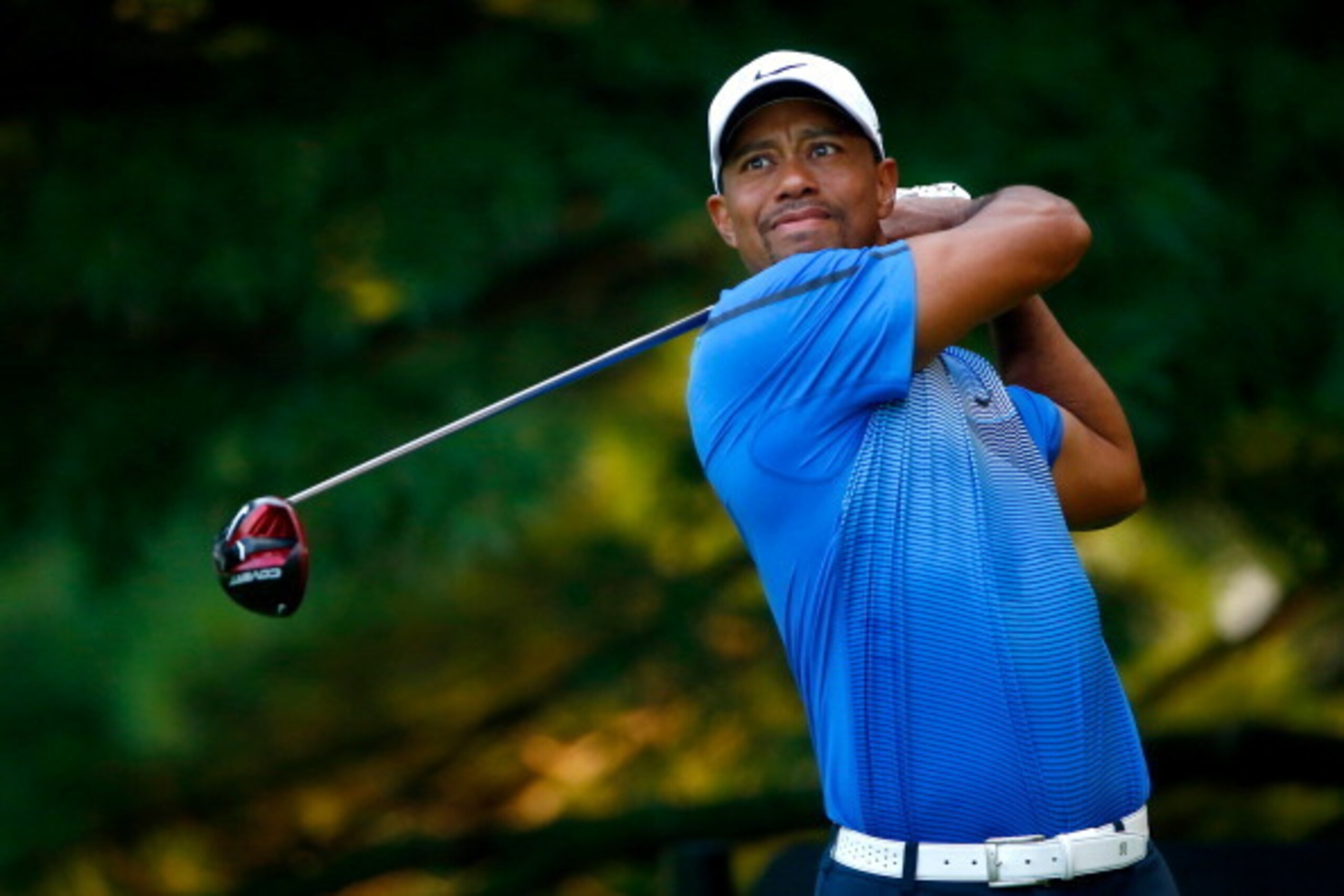 AKRON, OH - AUGUST 02: Tiger Woods hits off the second tee during the third round of the World Golf Championships-Bridgestone Invitational at Firestone Country Club South Course on August 2, 2014 in Akron, Ohio. (Photo by Sam Greenwood/Getty Images) AKRON, OH - AUGUST 02: Tiger Woods hits off the second tee during the third round of the World Golf Championships-Bridgestone Invitational at Firestone Country Club South Course on August 2, 2014 in Akron, Ohio. (Photo by Sam Greenwood/Getty Images)
