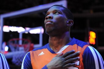 LOS ANGELES, CA - DECEMBER 30: Eric Bledsoe #2 of the Phoenix Suns stands in observance of the national anthem before a game against the Los Angeles Clippers at STAPLES Center on December 30, 2013 in Los Angeles, California. NOTE TO USER: User expressly a