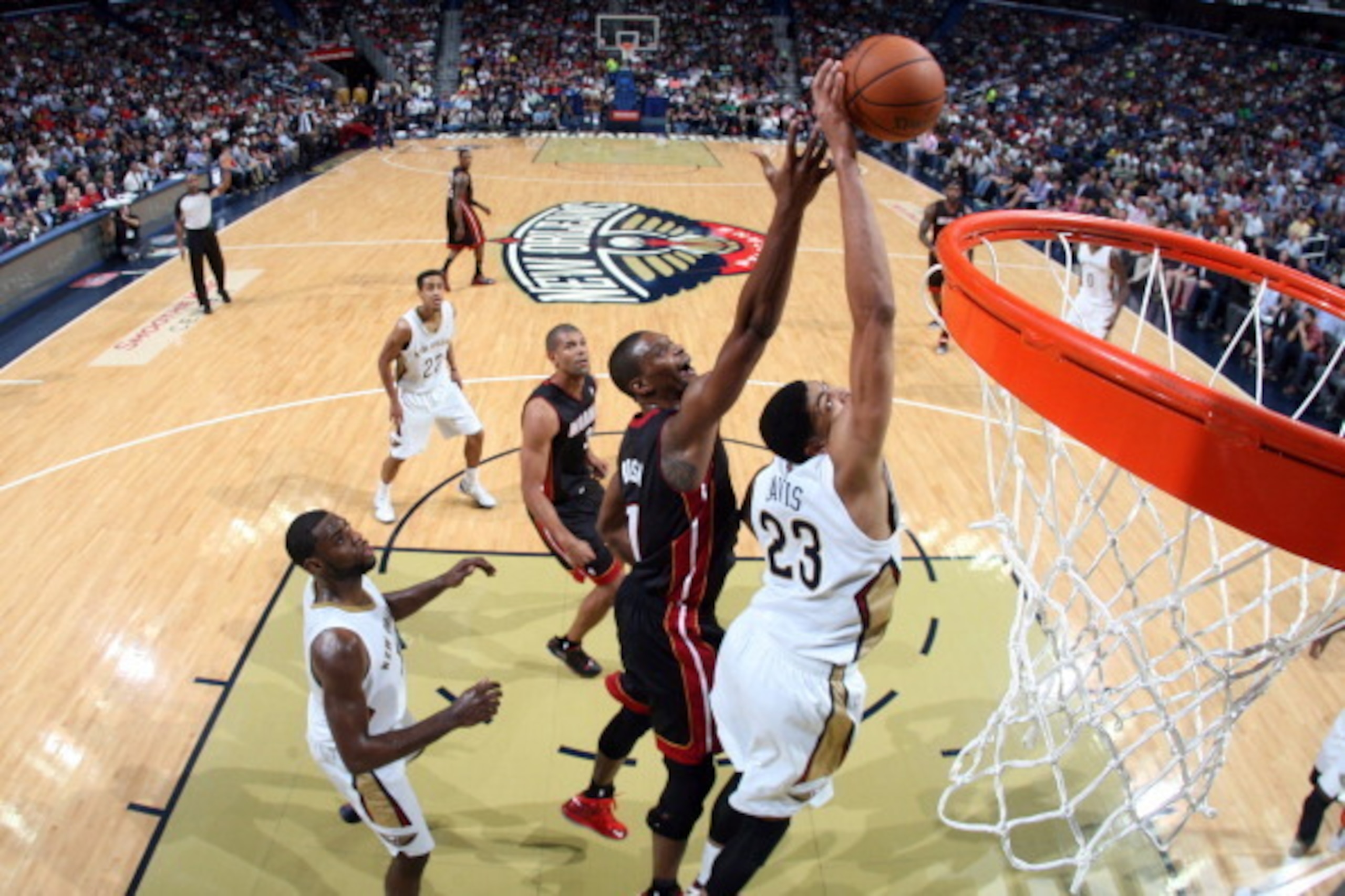 NEW ORLEANS, LA - MARCH 22:  Anthony Davis #23 of the New Orleans Pelicans grabs a rebound against the Miami Heat on March 22, 2014 at the Smoothie King Center in New Orleans, Louisiana. NOTE TO USER: User expressly acknowledges and agrees that, by downlo