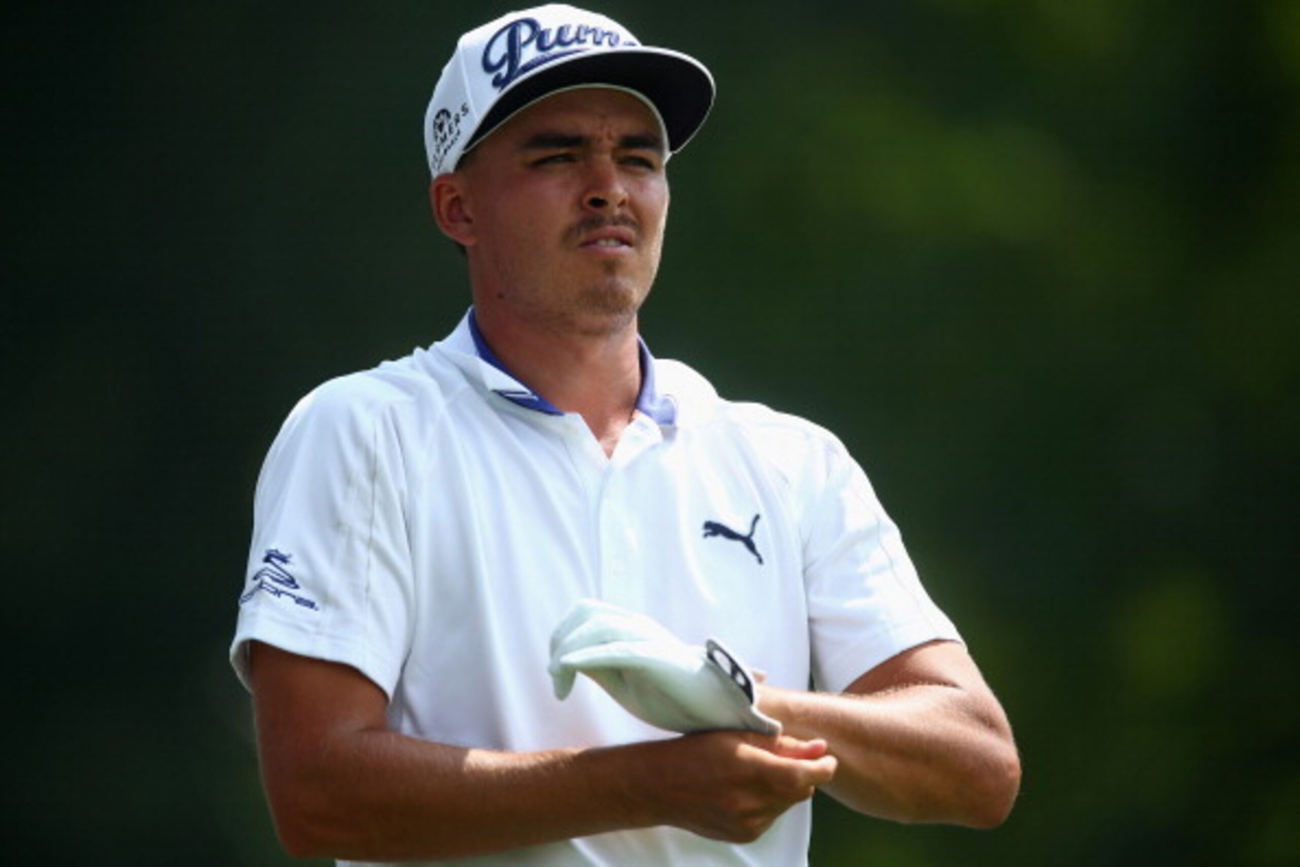 LOUISVILLE, KY - AUGUST 05: Rickie Fowler of the United States looks on during a practice round prior to the start of the 96th PGA Championship at Valhalla Golf Club on August 5, 2014 in Louisville, Kentucky.  (Photo by Jeff Gross/Getty Images)