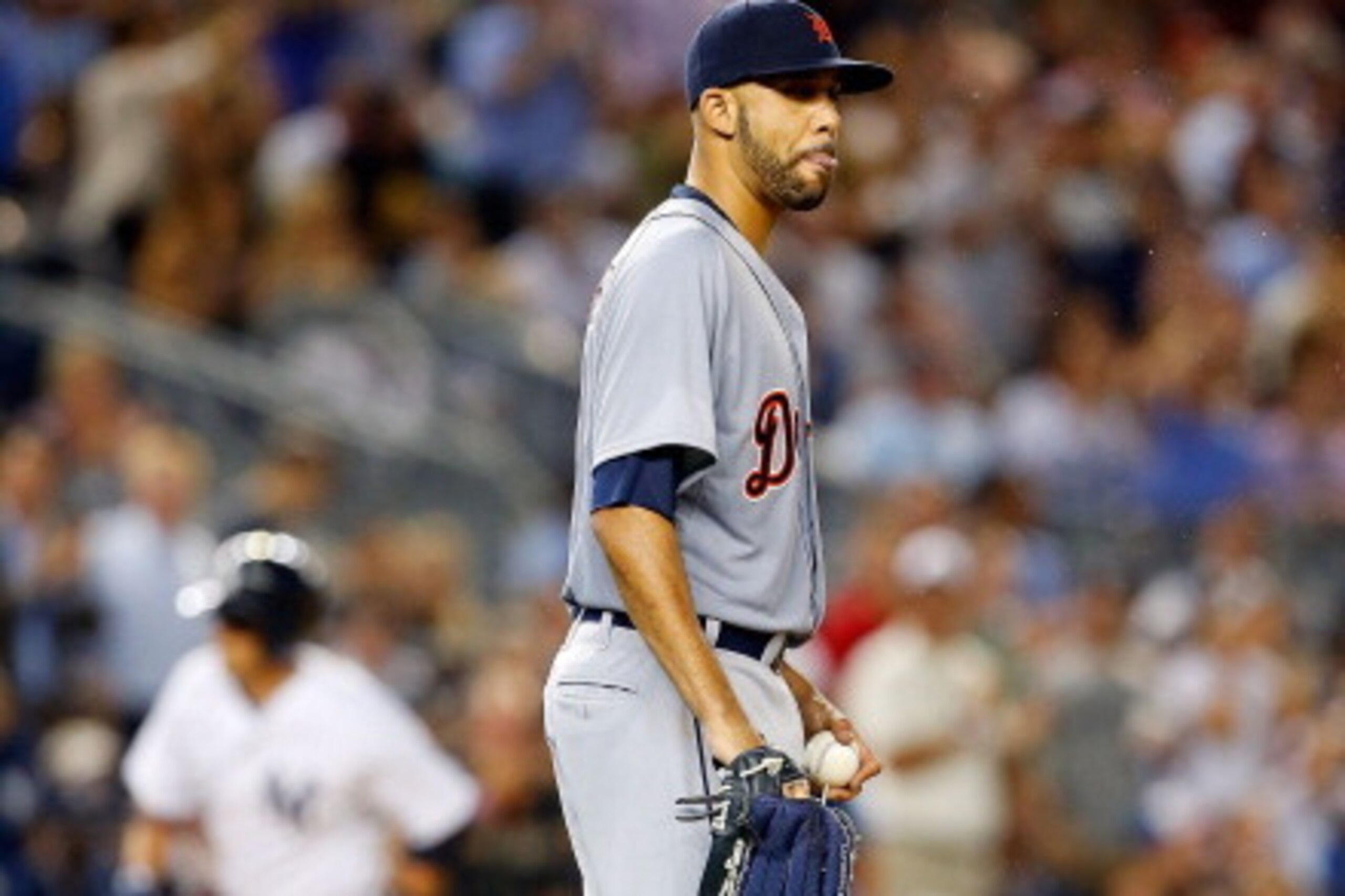 NEW YORK, NY - AUGUST 05:  David Price #14 of the Detroit Tigers looks on after surrendering a fifth inning home run against Martin Prado #14 of the New York Yankees at Yankee Stadium on August 5, 2014 in the Bronx borough of New York City.  (Photo by Jim