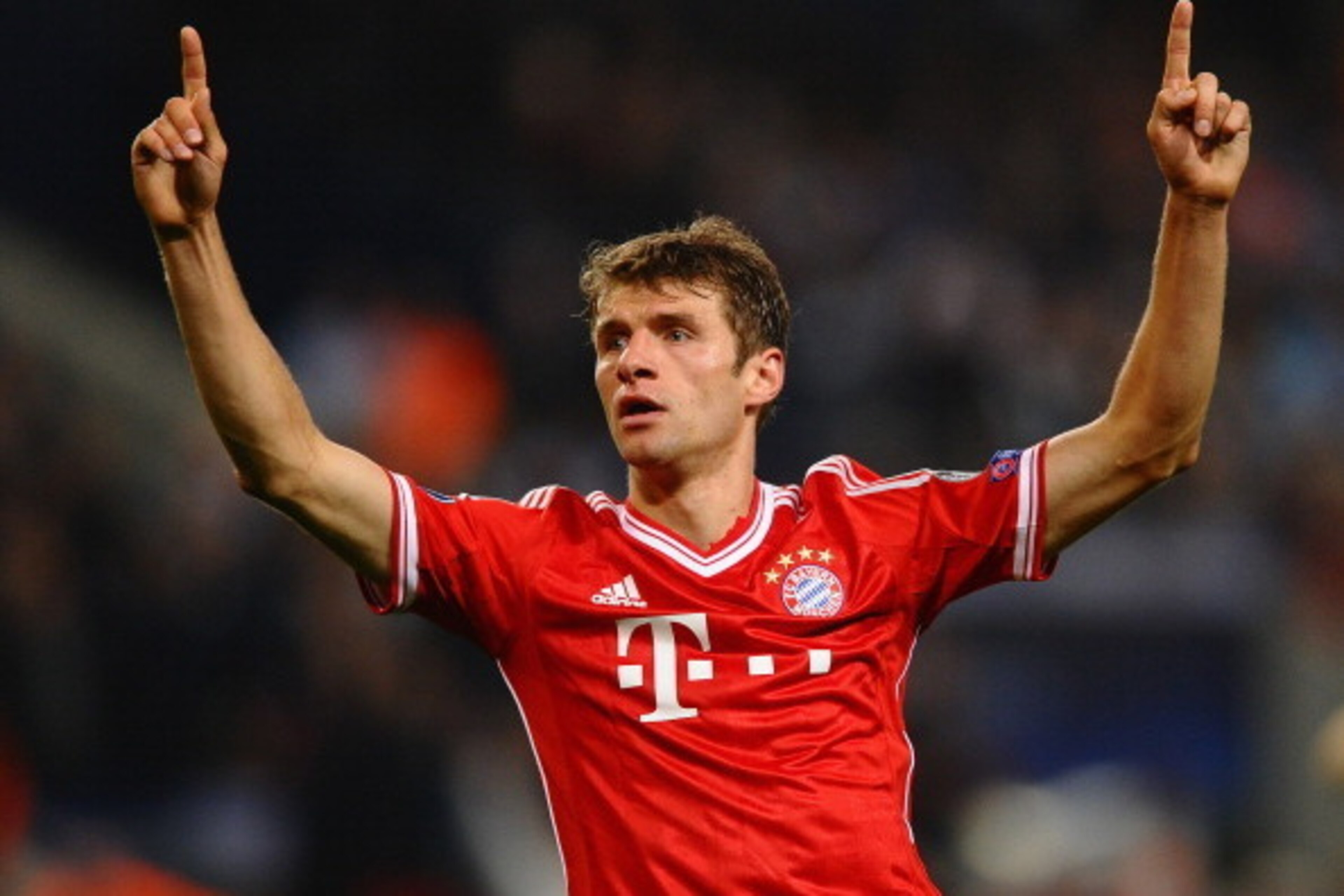 MANCHESTER, ENGLAND - OCTOBER 02:  Thomas Muller of FC Bayern Muenchen celebrates scoring the second goal during the UEFA Champions League Group D match between Manchester City and  FC Bayern Muenchen at Etihad Stadium on October 2, 2013 in Manchester, En
