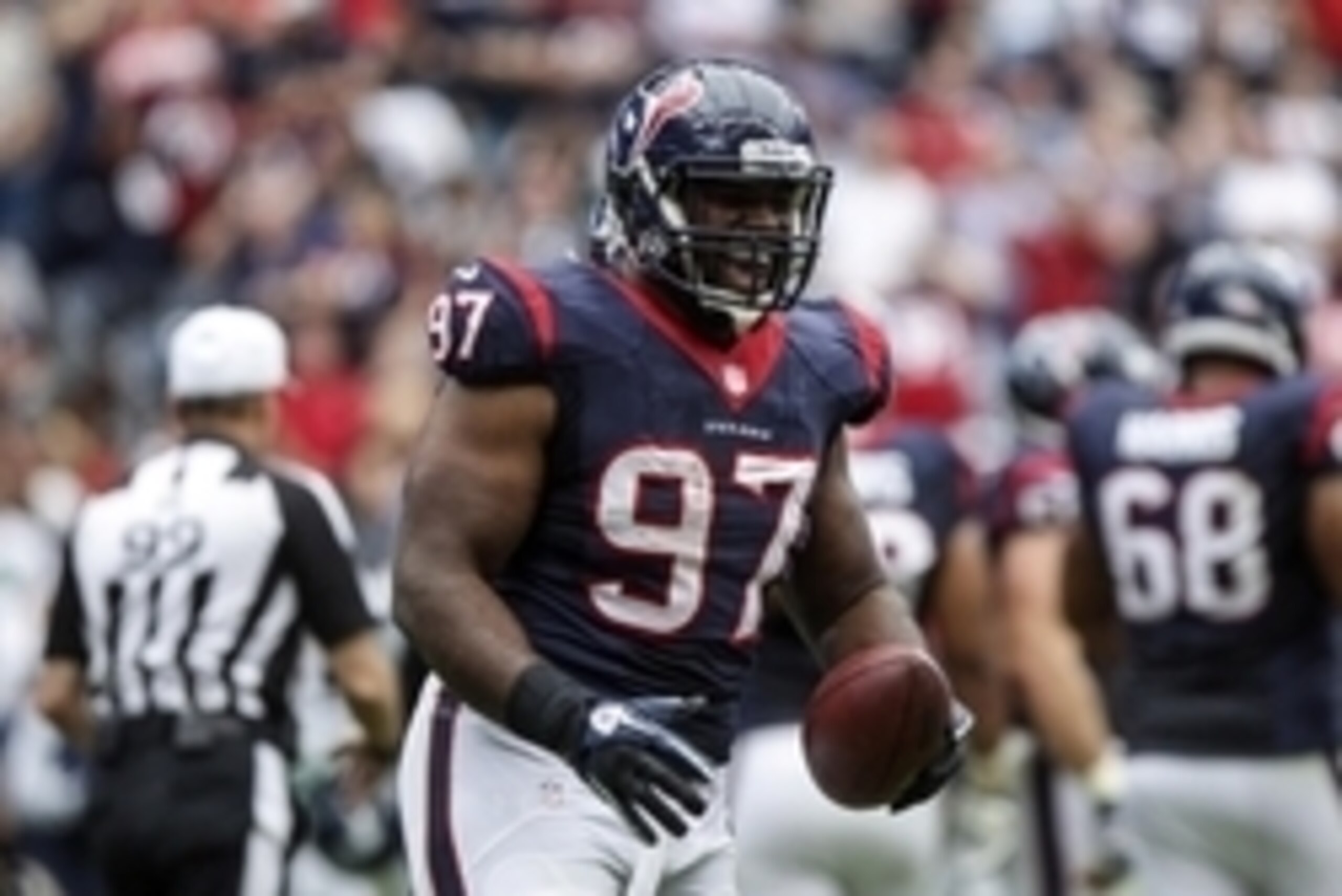 Sep 29, 2013; Houston, TX, USA; Houston Texans defensive tackle Terrell McClain (97) reacts after recovering a fumble during the second quarter against the Seattle Seahawks at Reliant Stadium. Mandatory Credit: Troy Taormina-USA TODAY Sports