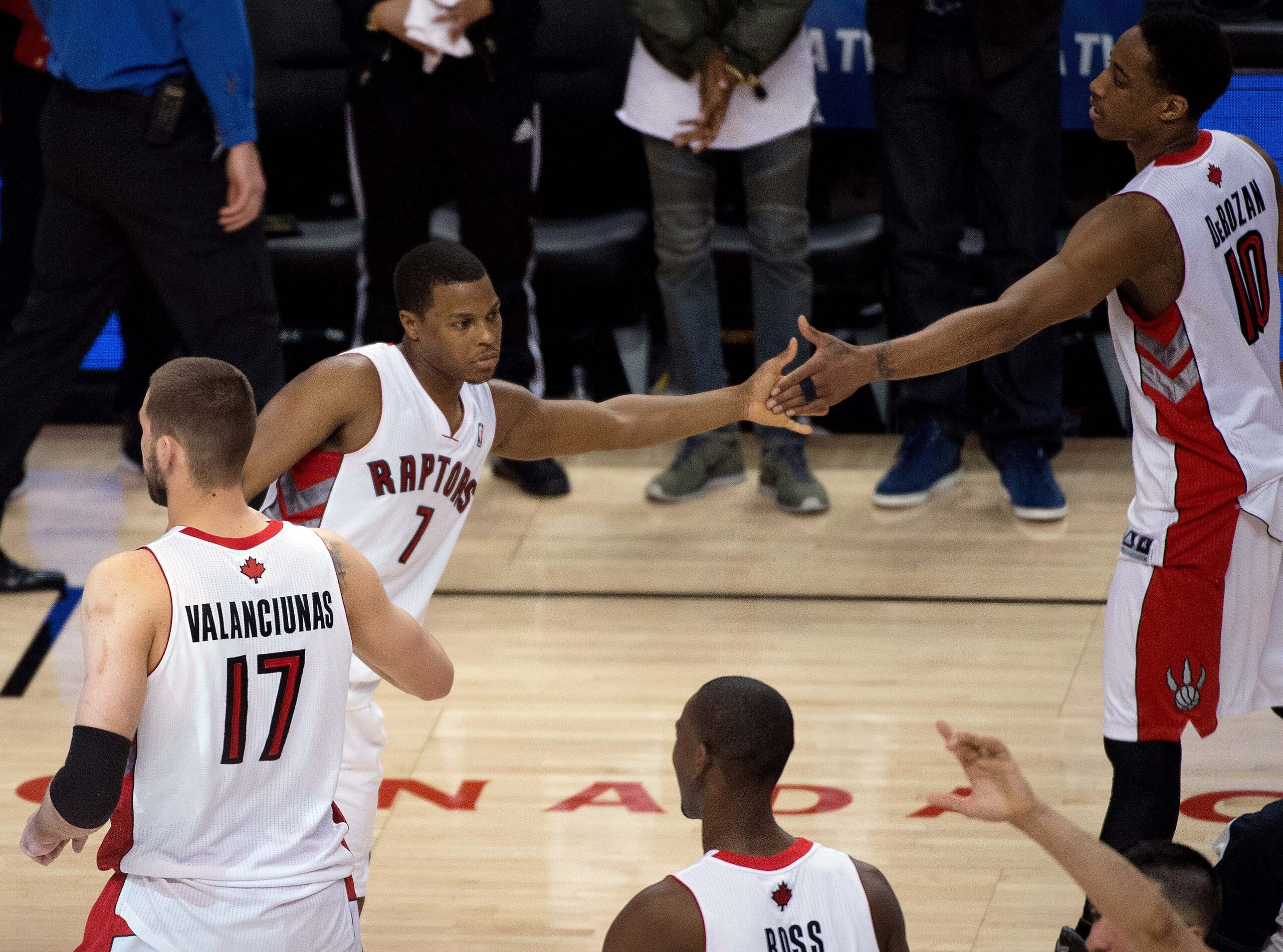 Apr 30, 2014; Toronto, Ontario, CAN; Toronto Raptors guard DeMar DeRozan (10) celebrates the win with Toronto Raptors guard Kyle Lowry (7) in game five of the first round of the 2014 NBA Playoffs against the Brooklyn Nets at Air Canada Centre. The Toronto