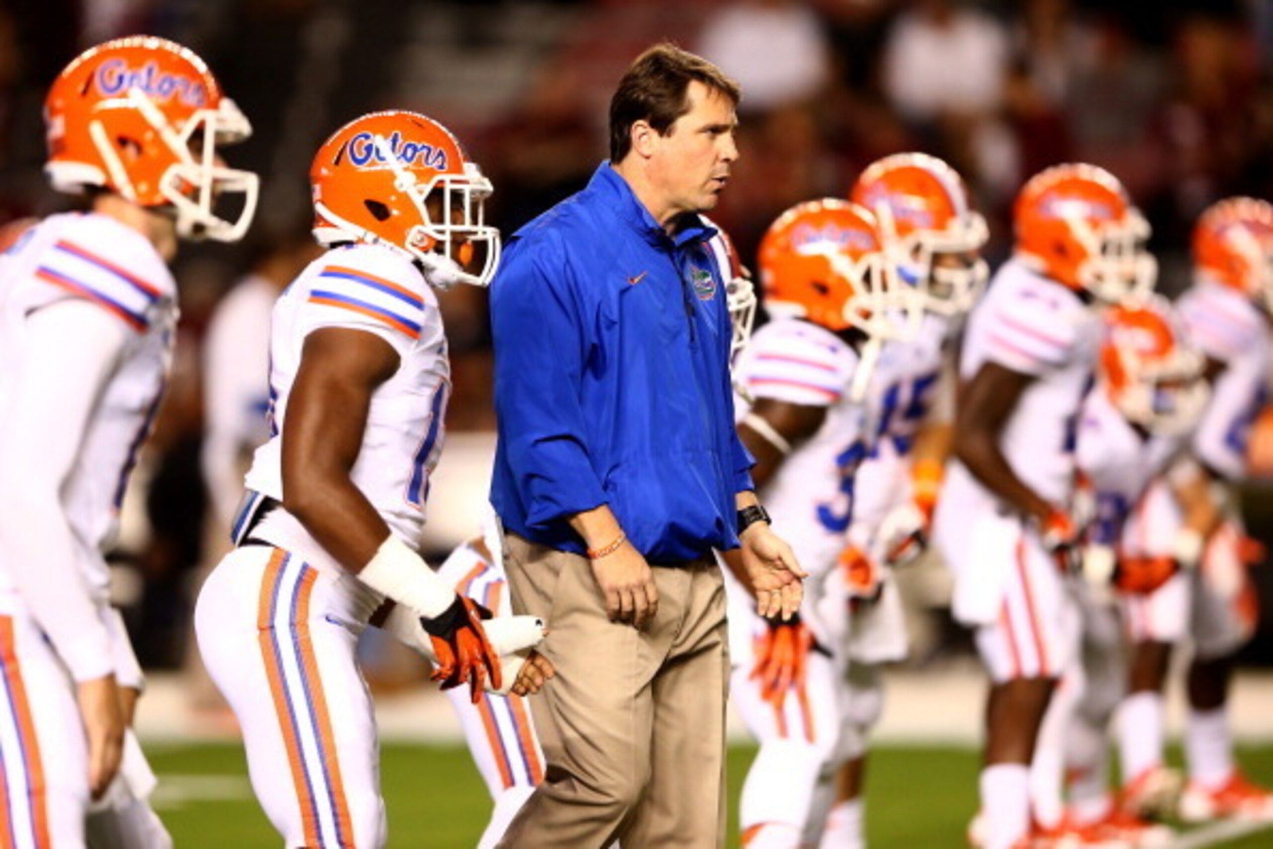 COLUMBIA, SC - NOVEMBER 16:  Head coach Will Muschamp of the Florida Gators watches his team warm up before their game against the South Carolina Gamecocks at Williams-Brice Stadium on November 16, 2013 in Columbia, South Carolina.  (Photo by Streeter Lec