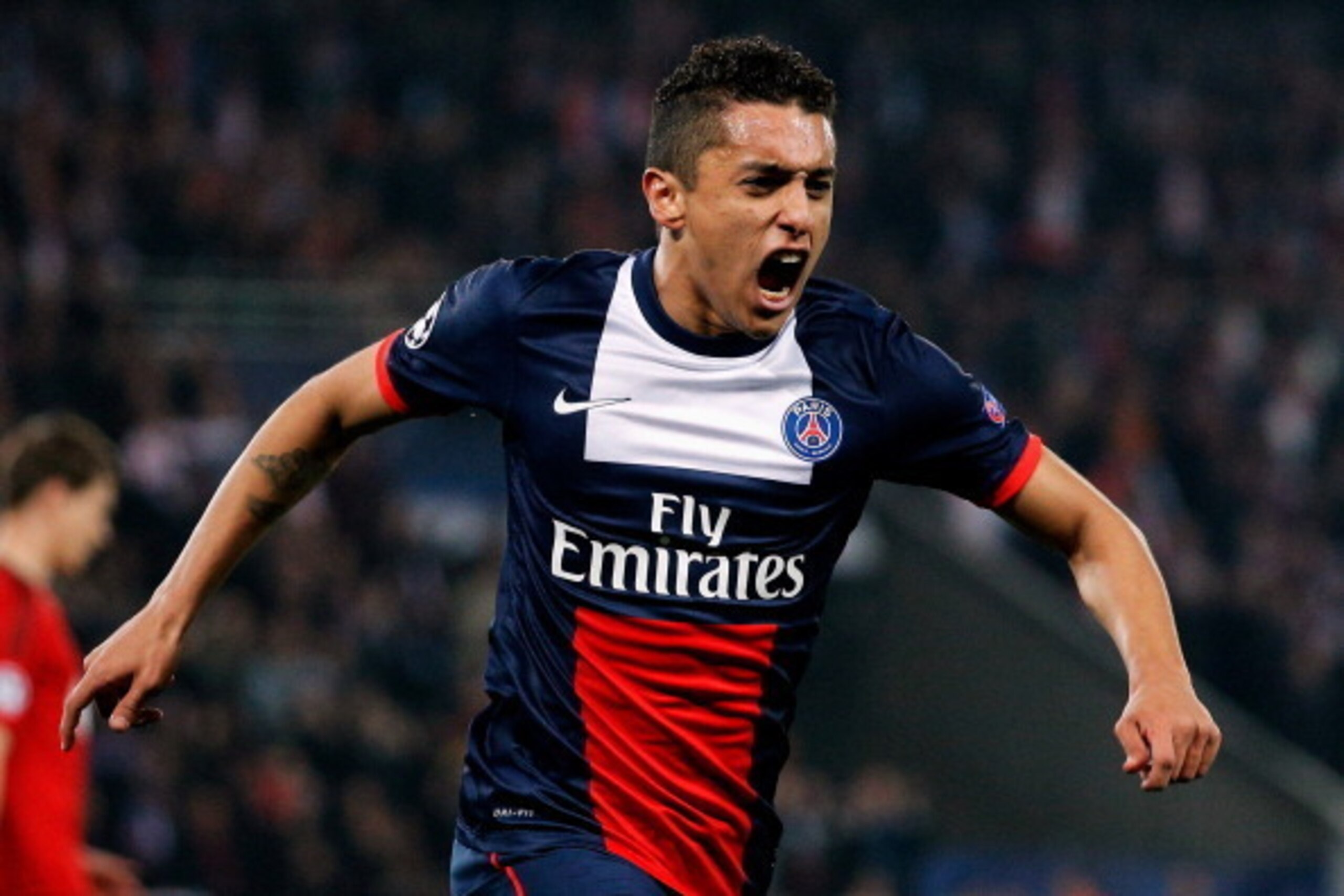 PARIS, FRANCE - MARCH 12:  Marquinhos #5 of Paris Saint-Germain celebrates after he scores their first goal during the UEFA Champions League Round of 16 second leg match between Paris Saint-Germain FC and Bayer Leverkusen at Parc des Princes on March 12, 