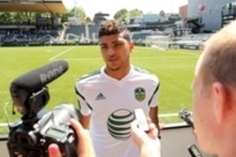 Aug 5, 2014; Portland, OR, USA; DeAndre Yedlin of the Seattle Sounders is interviewed during a training session in advance of the 2014 MLS All Star Game at Providence Park. Mandatory Credit: Craig Mitchelldyer-USA TODAY Sports