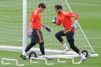MADRID, SPAIN - OCTOBER 22:  Iker Casillas (L) and Diego Lopez during a training session ahead of their UEFA Champions League Group B match against Juventus, at Valdebebas training ground on October 22, 2013 in Madrid, Spain. (Photo by Denis Doyle/Getty I