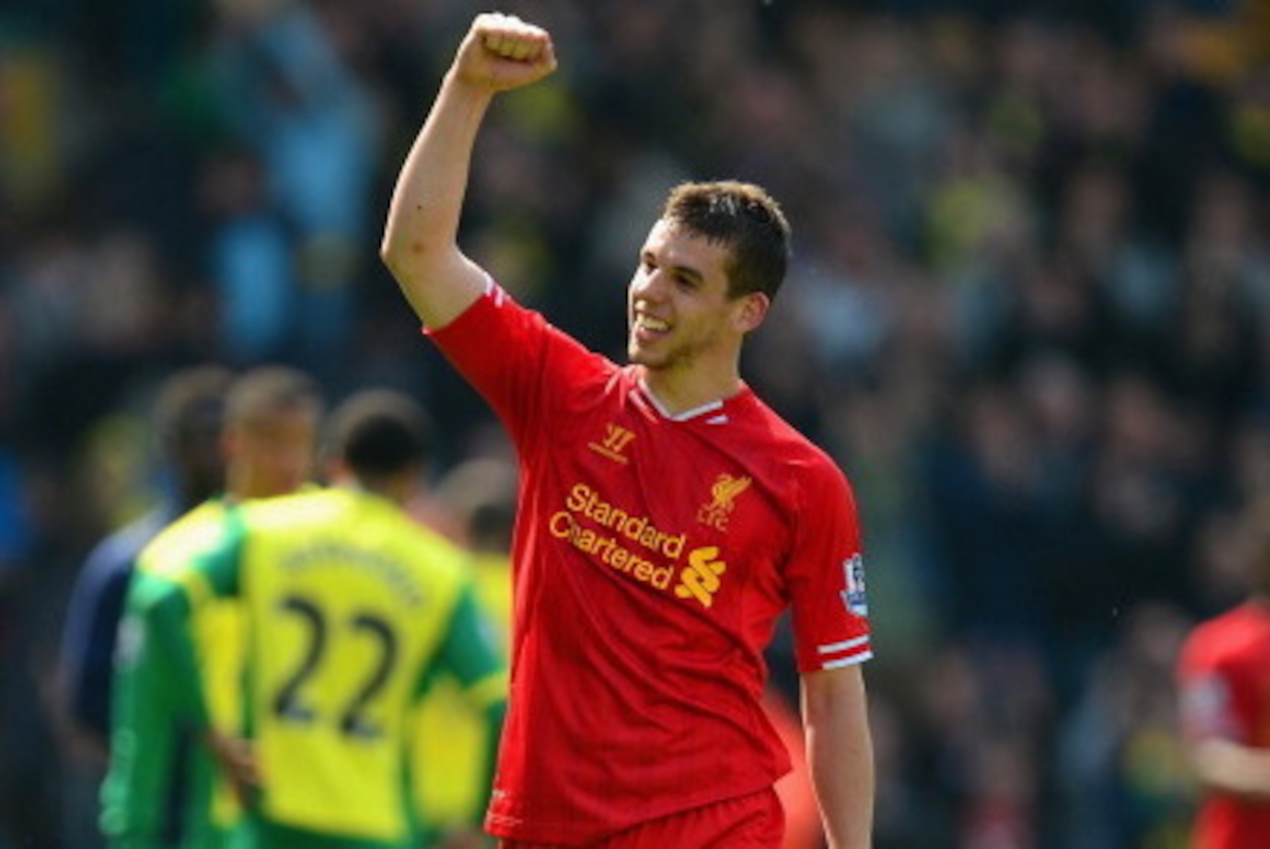 NORWICH, ENGLAND - APRIL 20:  Jon Flanagan of Liverpool celebrates victory at the final whistle during the Barclays Premier League match between Norwich City and Liverpool at Carrow Road on April 20, 2014 in Norwich, England.  (Photo by Jamie McDonald/Get