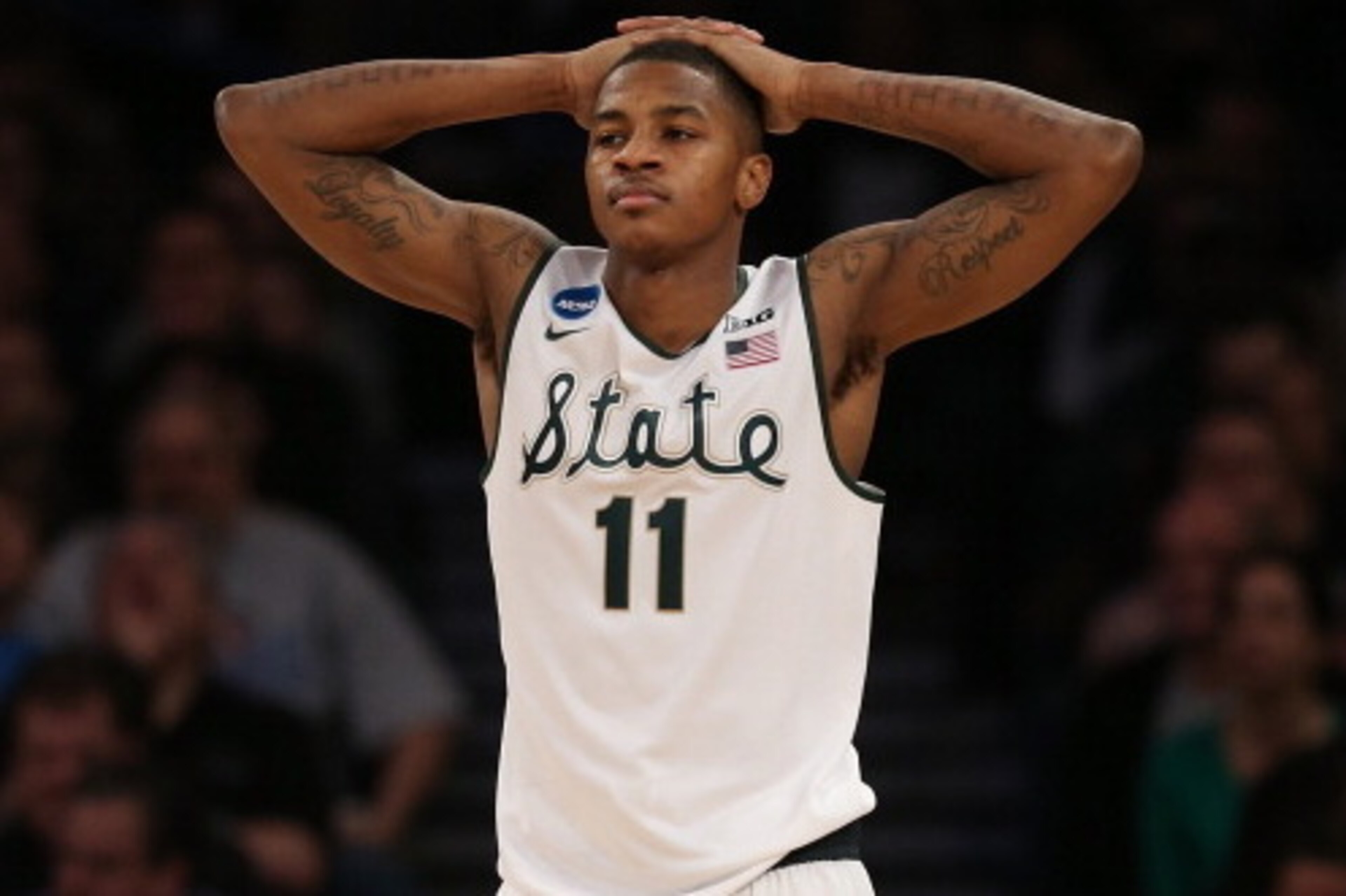 NEW YORK, NY - MARCH 30:  Keith Appling #11 of the Michigan State Spartans reacts against the Connecticut Huskies during the East Regional Final of the 2014 NCAA Men's Basketball Tournament at Madison Square Garden on March 30, 2014 in New York City.  (Ph