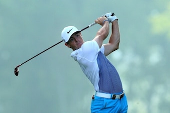 LOUISVILLE, KY - AUGUST 06:  Rory McIlroy of Northern Ireland hits a shot during a practice round prior to the start of the 96th PGA Championship at Valhalla Golf Club on August 6, 2014 in Louisville, Kentucky.  (Photo by Jeff Gross/Getty Images)
