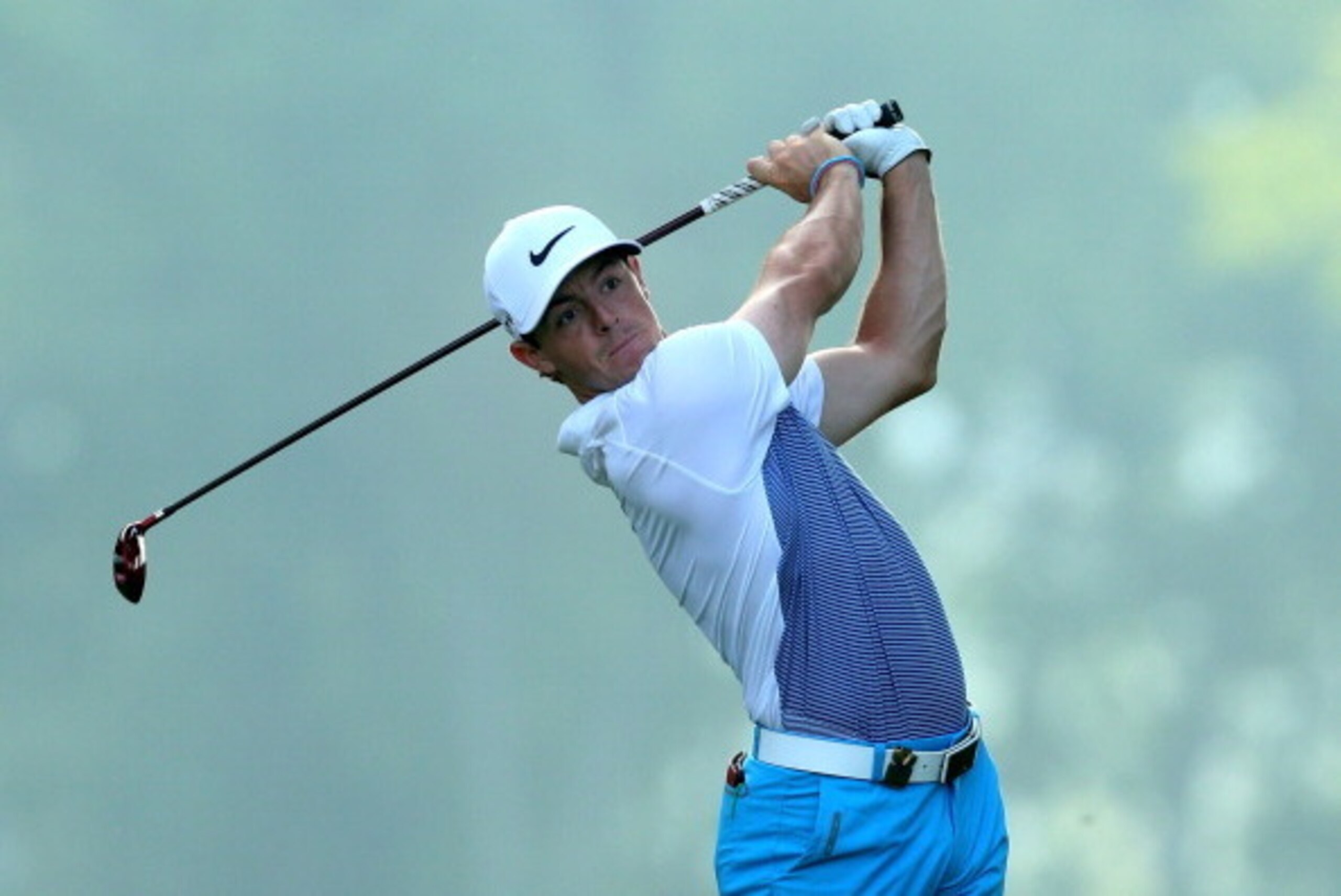 LOUISVILLE, KY - AUGUST 06:  Rory McIlroy of Northern Ireland hits a shot during a practice round prior to the start of the 96th PGA Championship at Valhalla Golf Club on August 6, 2014 in Louisville, Kentucky.  (Photo by Jeff Gross/Getty Images)