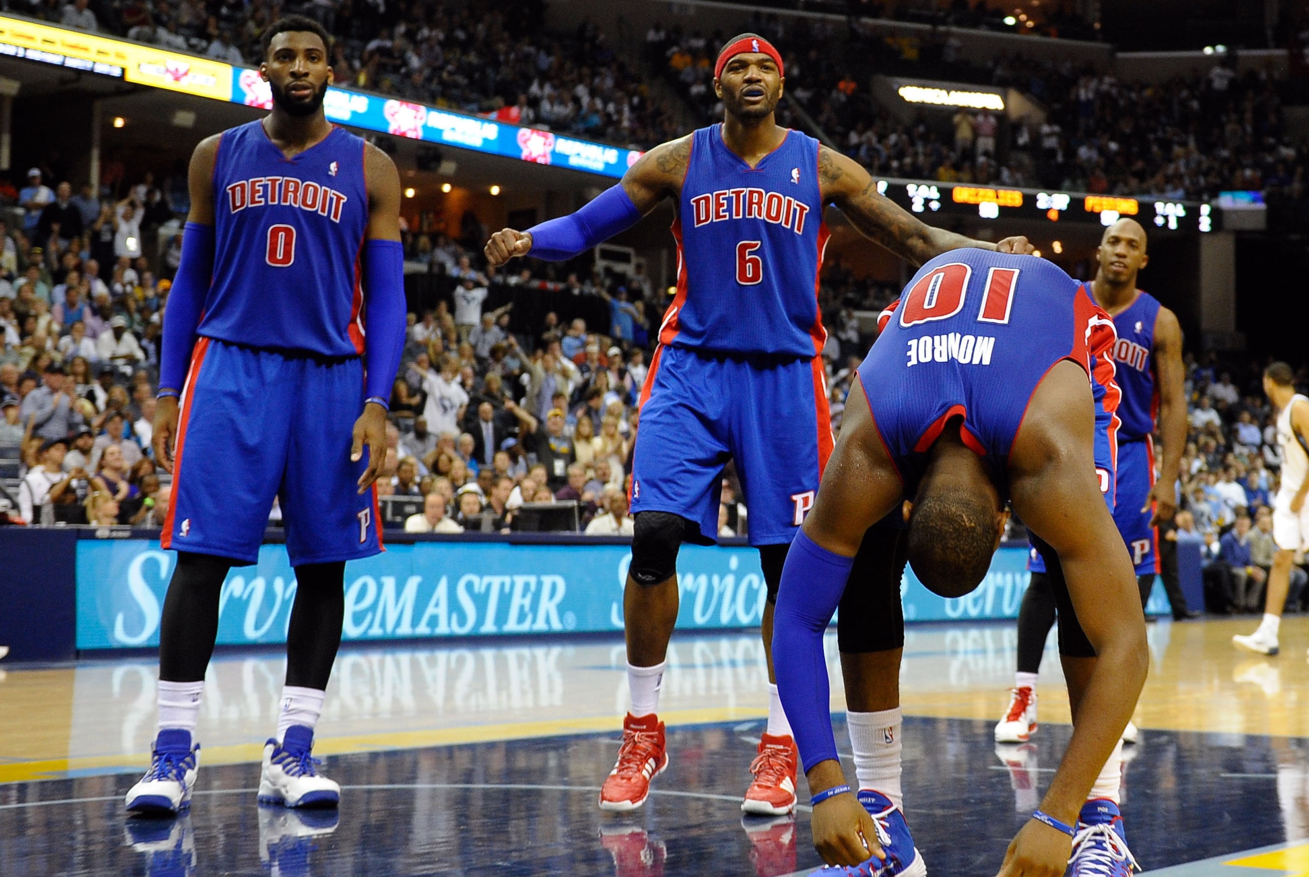 Nov 1, 2013; Memphis, TN, USA; Detroit Pistons center Andre Drummond (0) Detroit Pistons small forward Josh Smith (6) and Detroit Pistons center Greg Monroe (10) react to call against Memphis Grizzlies during the second half at FedExForum. Memphis Grizzli