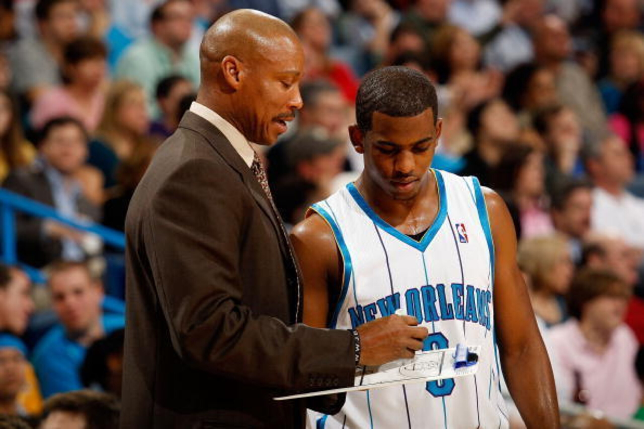 NEW ORLEANS - DECEMBER 26:  Head coach Byron Scott talks with Chris Paul #3 of the New Orleans Hornets during a timeout against the Houston Rockets on December 26, 2008 at the New Orleans Arena in New Orleans, Louisiana.   The Hornets defeated the Rockets