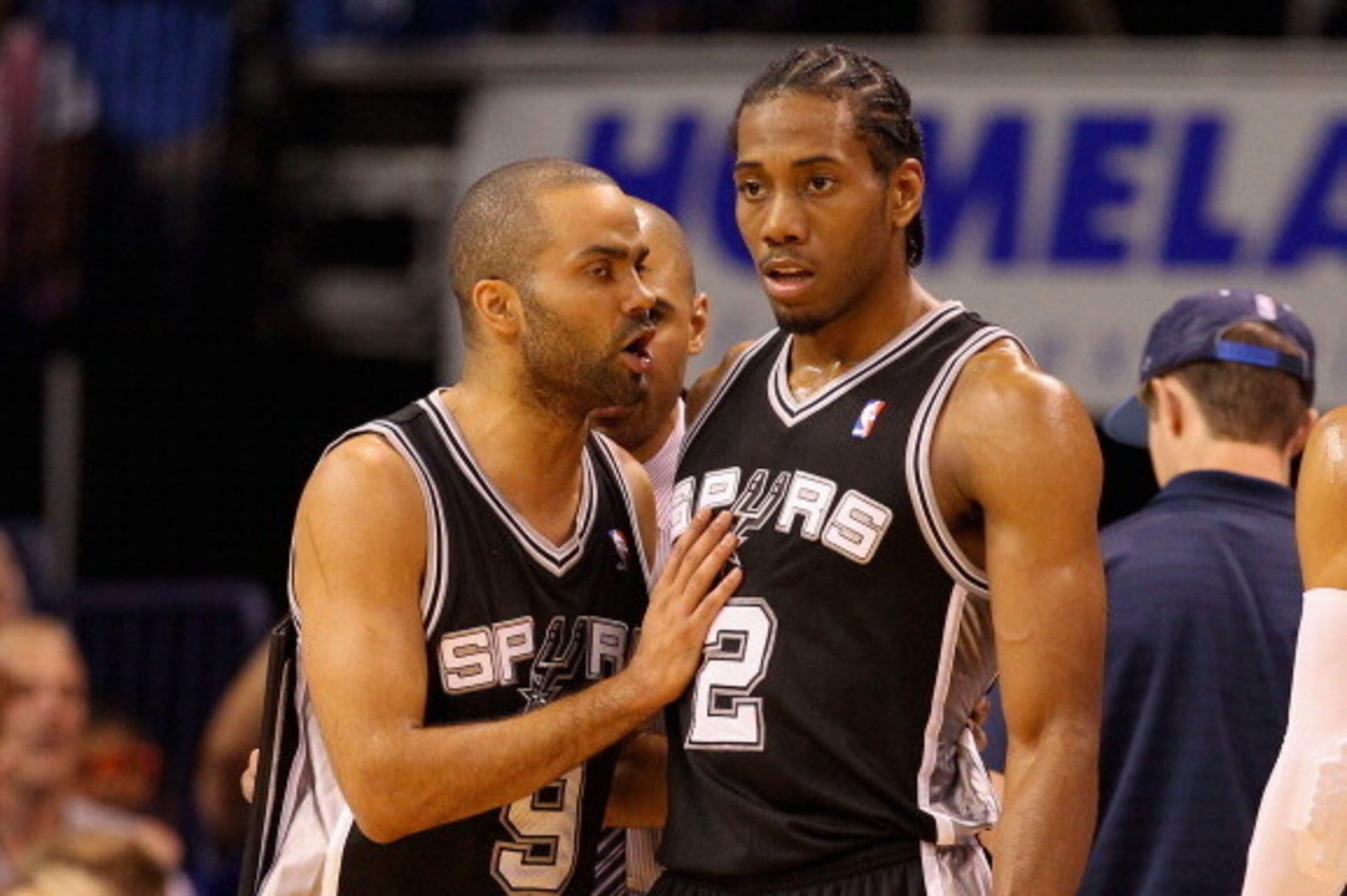 OKLAHOMA CITY, OK - MAY 25: Tony Parker #9 and Kawhi Leonard #2 of the San Antonio Spurs talk in the second quarter against the Oklahoma City Thunder during Game Three of the Western Conference Finals of the 2014 NBA Playoffs at Chesapeake Energy Arena on